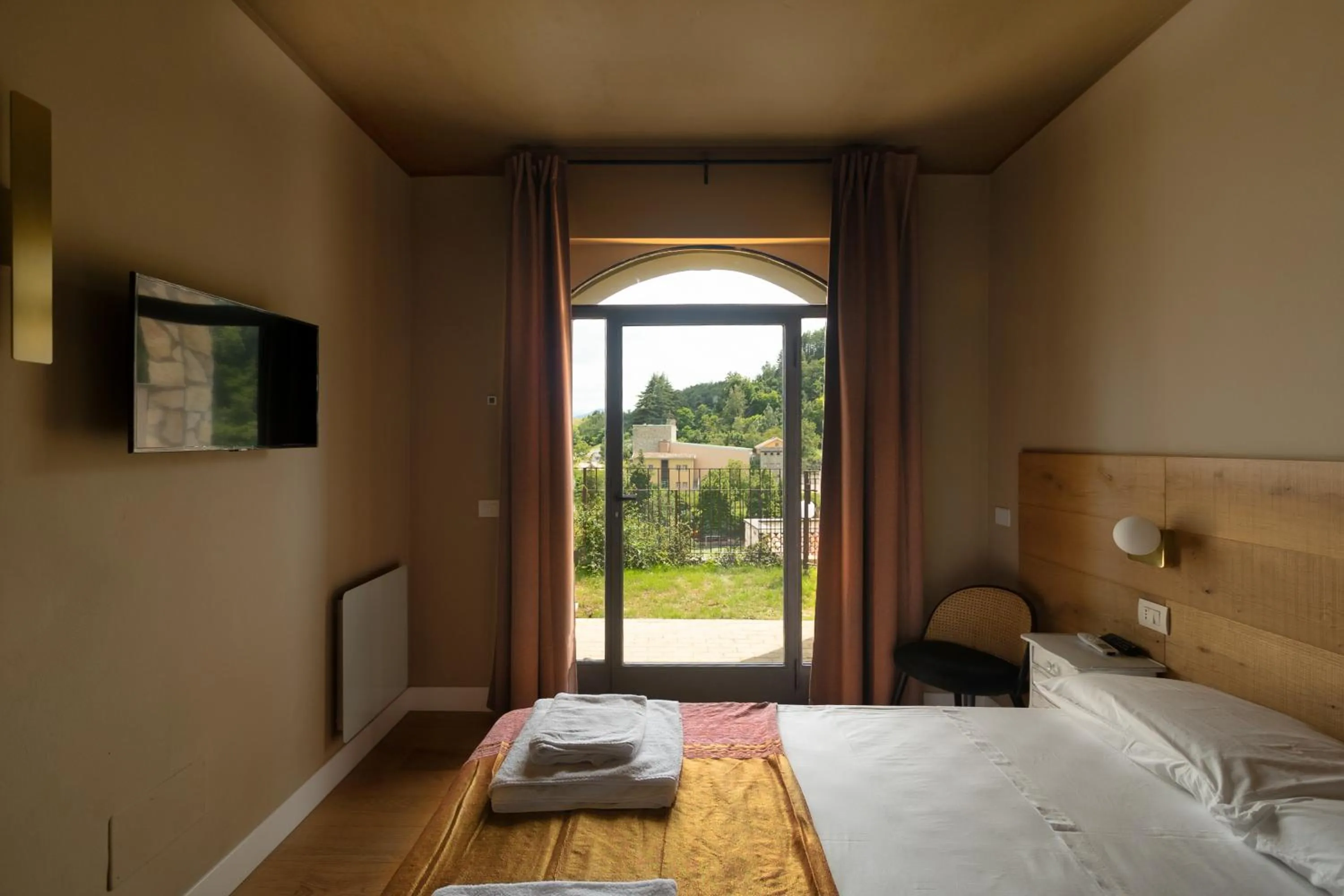 Bed in Luce Boutique Hotel