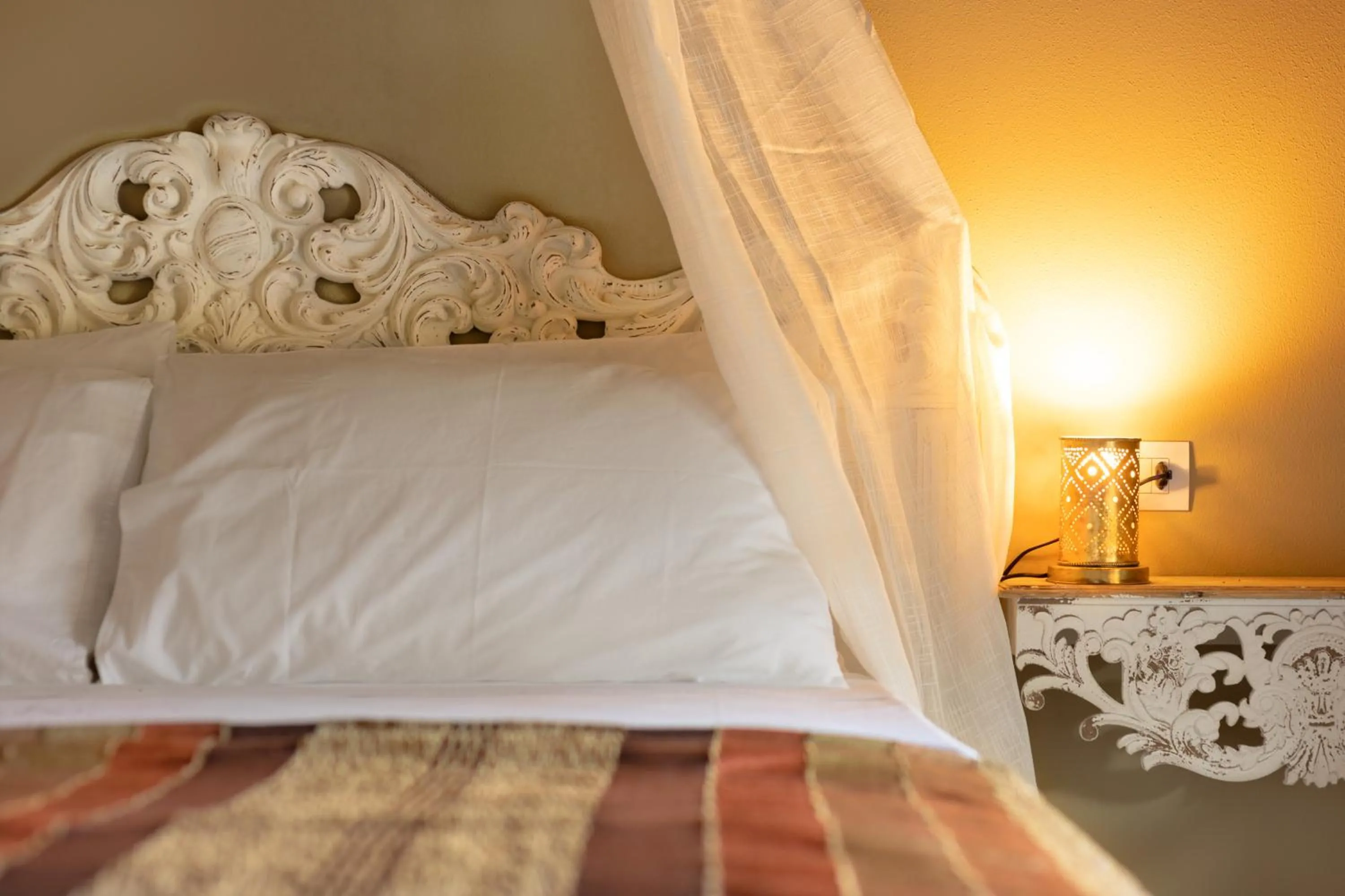 Bed in Luce Boutique Hotel