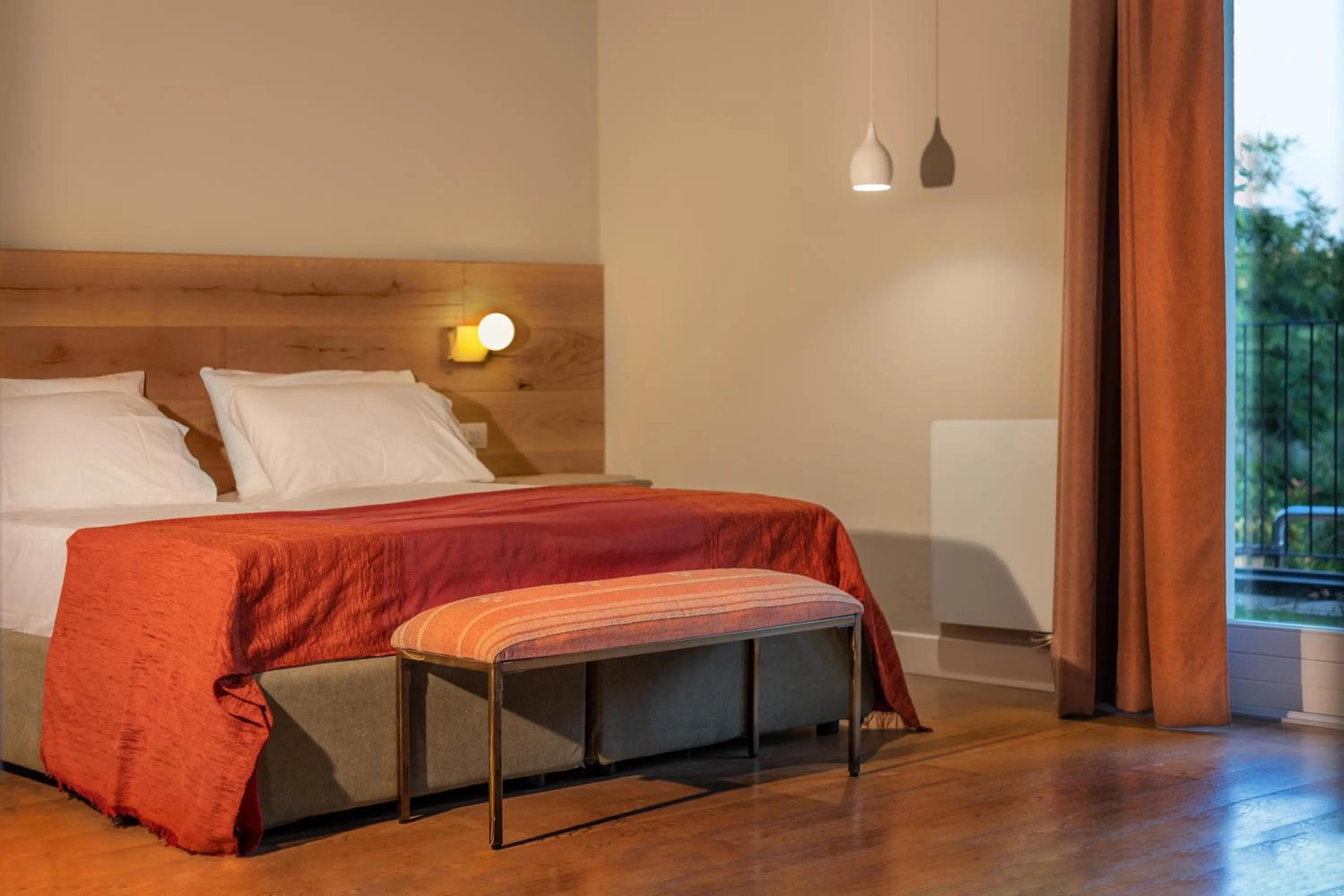 Bed in Luce Boutique Hotel