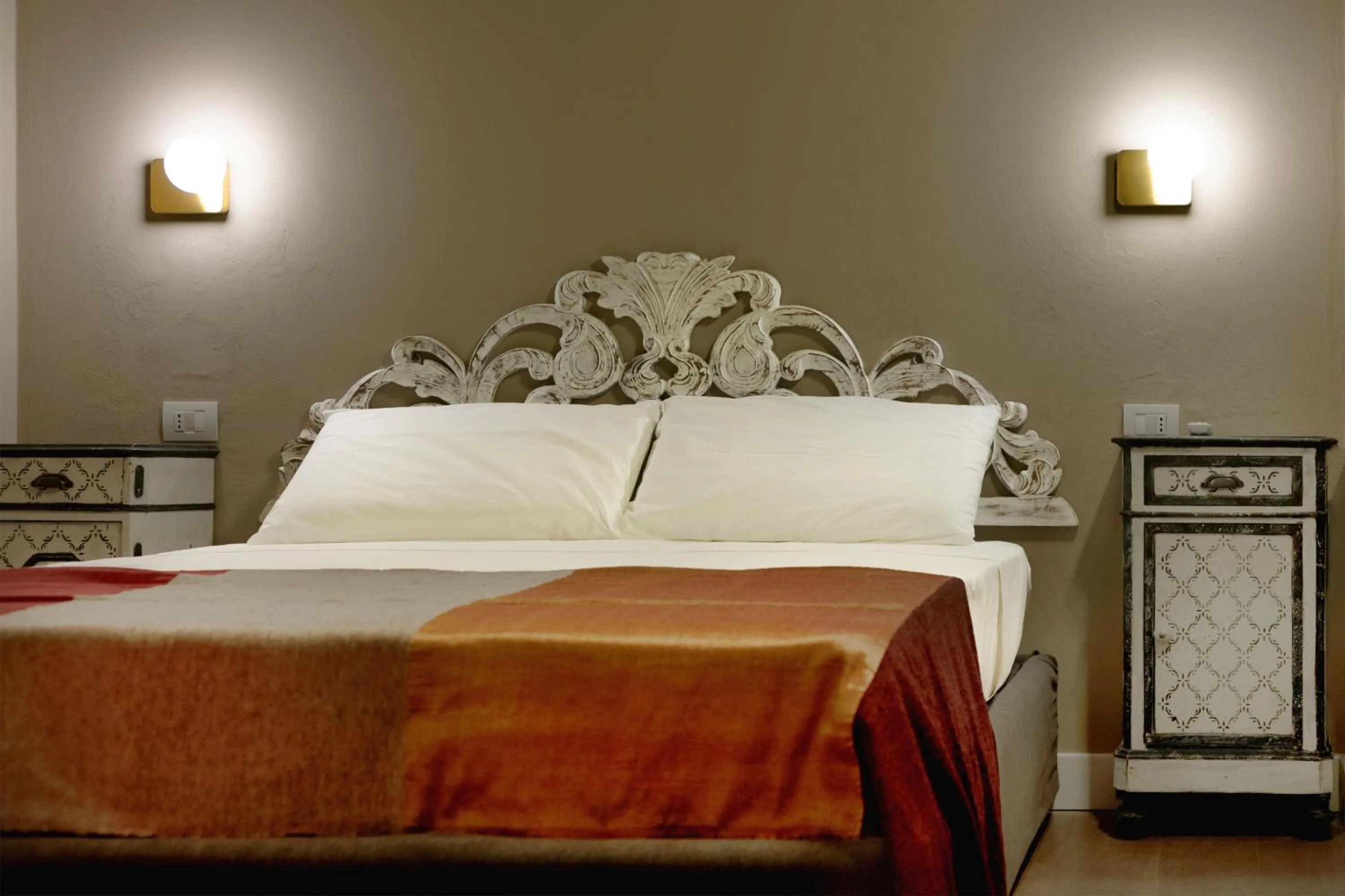 Bed in Luce Boutique Hotel