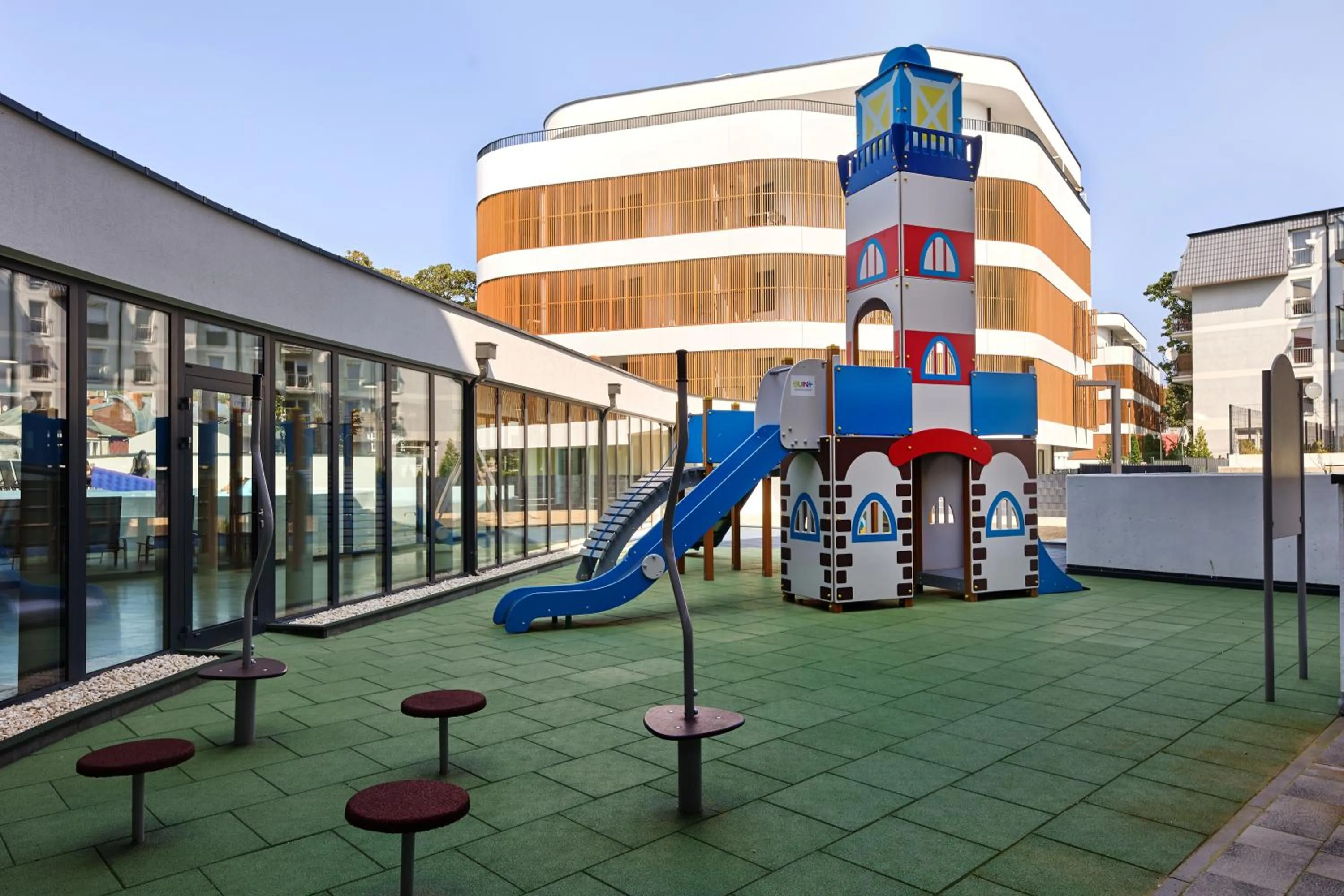 Children play ground in Resort Baltic Waves Apartments - Pool & Spa