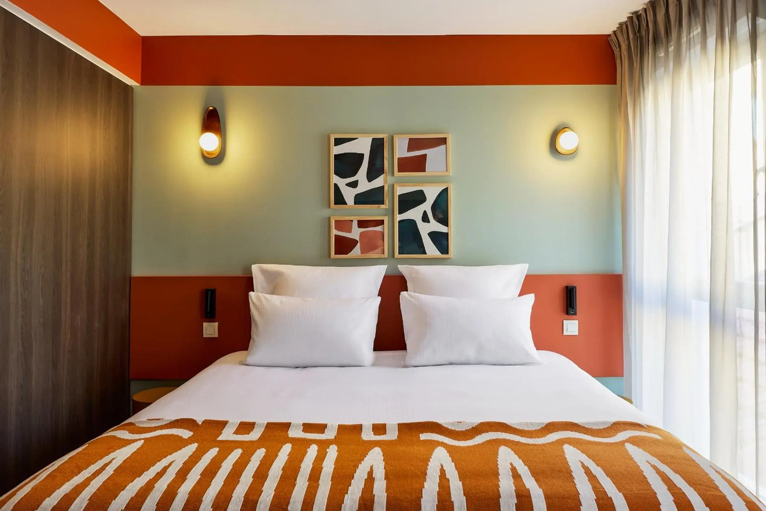 Bed in Hôtel Ligo by HappyCulture Bed in Hôtel Ligo by HappyCulture