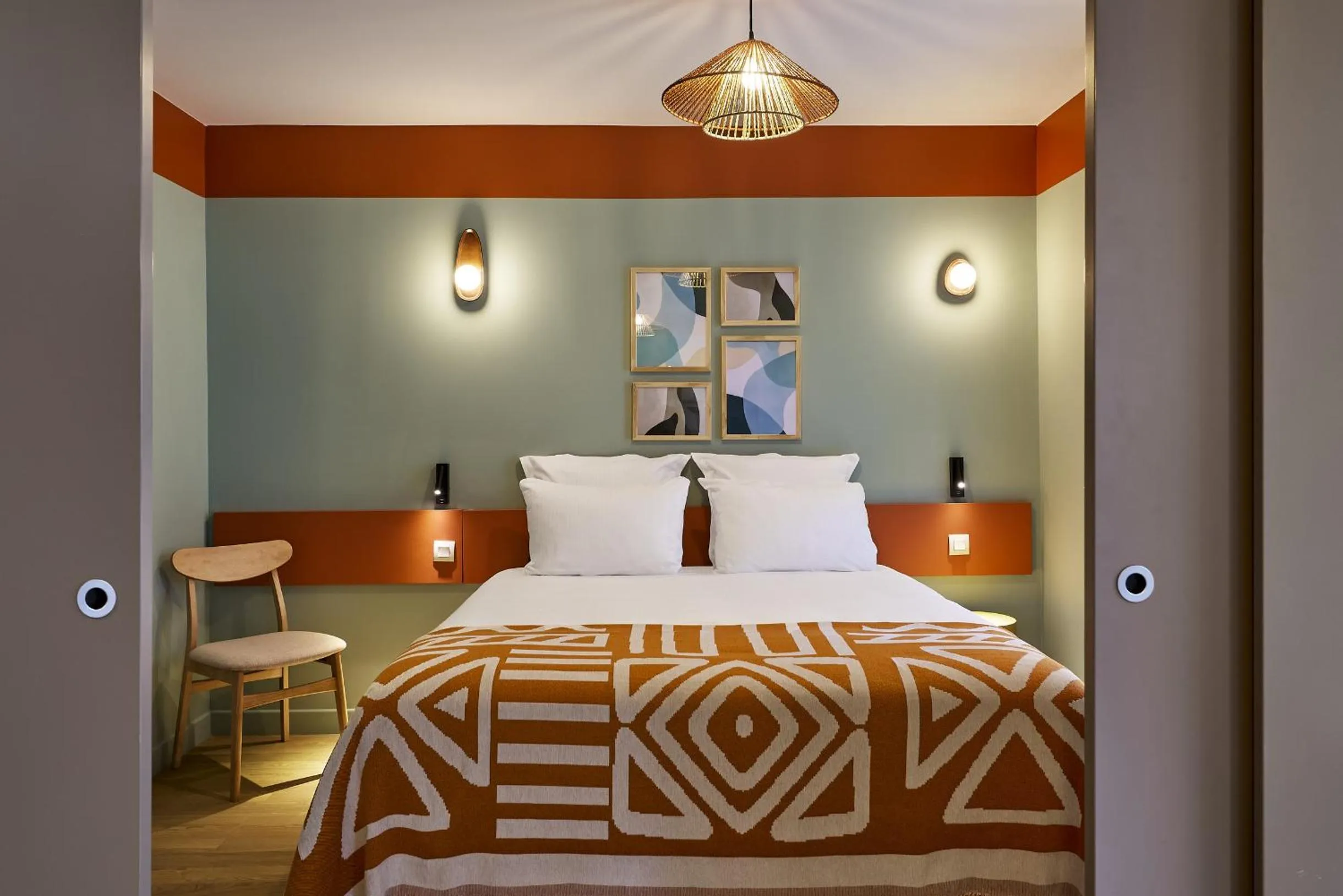 Bed in Hôtel Ligo by HappyCulture