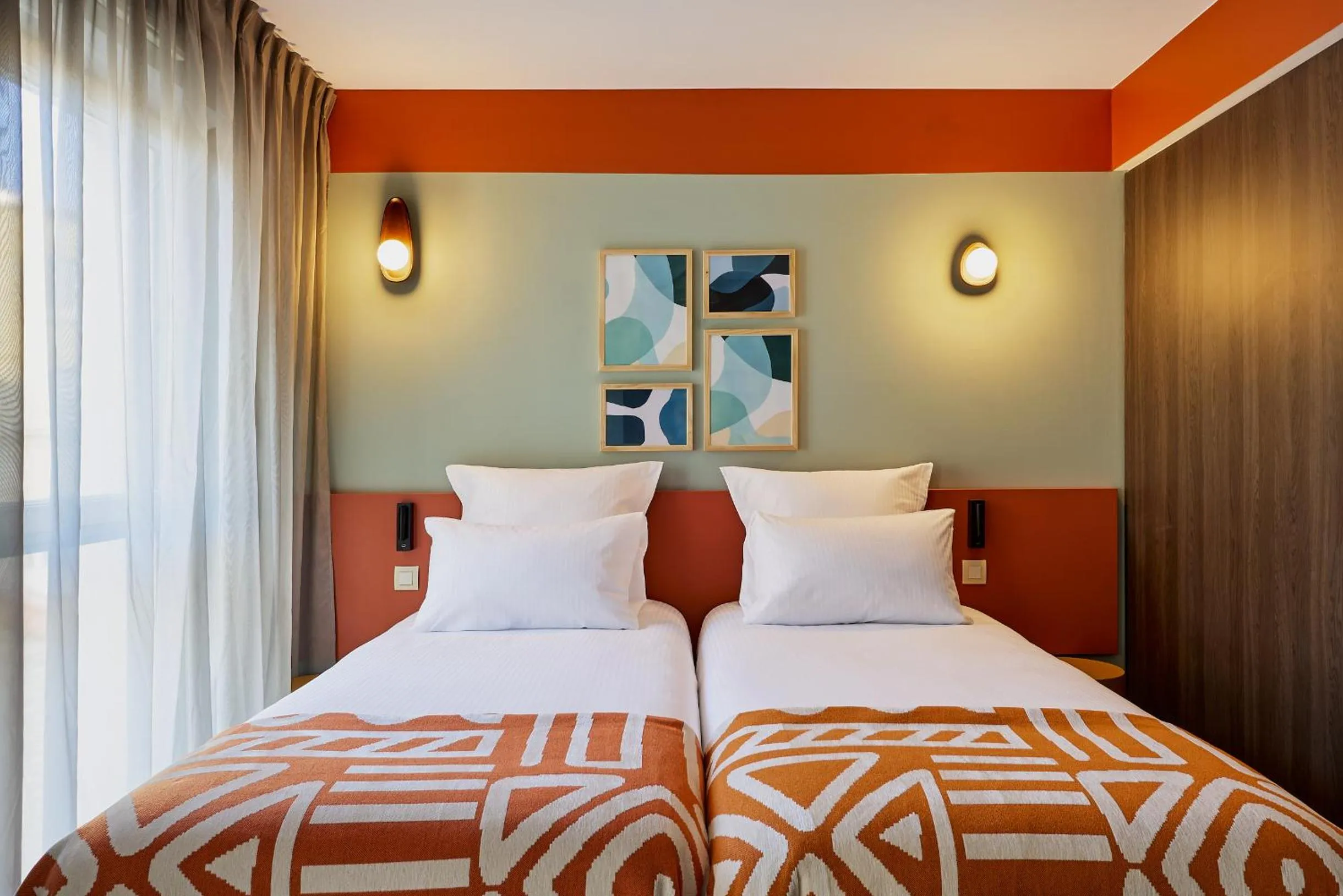 Bed in Hôtel Ligo by HappyCulture