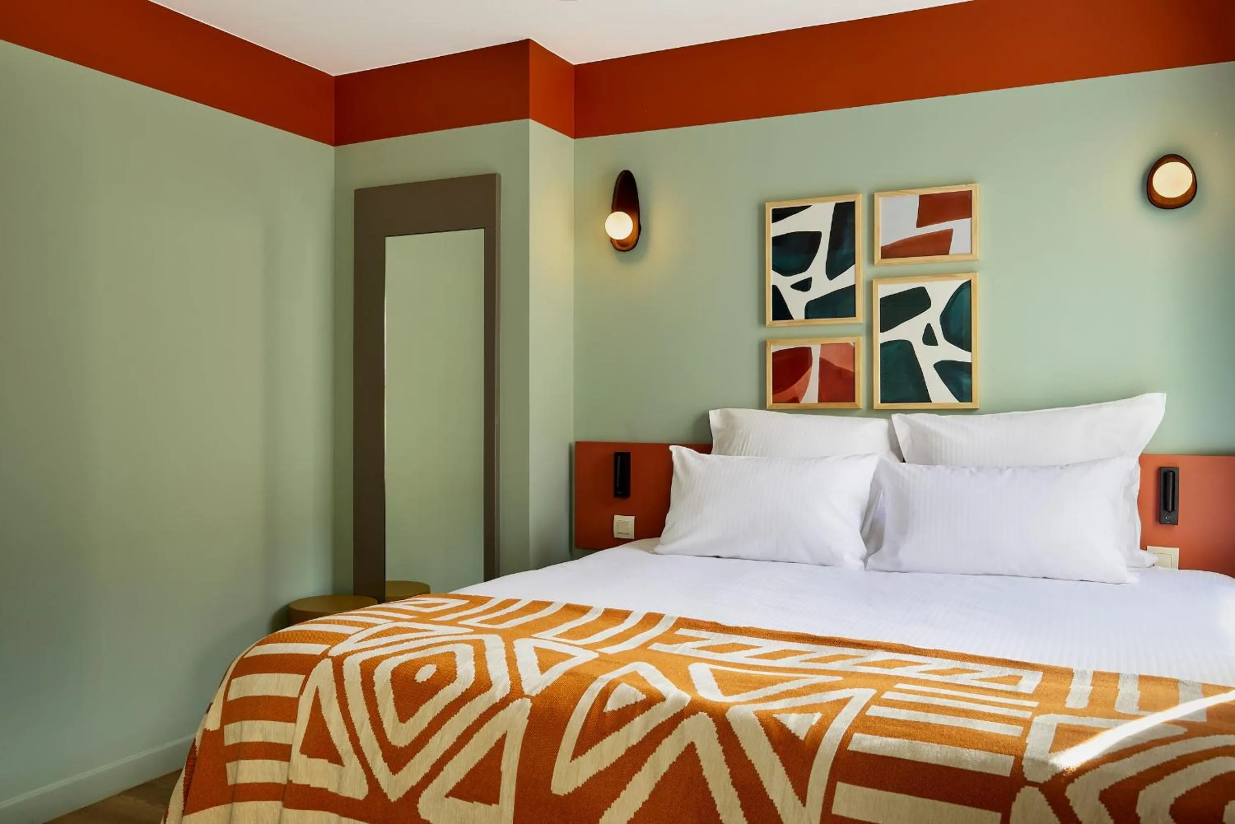 Bed in Hôtel Ligo by HappyCulture