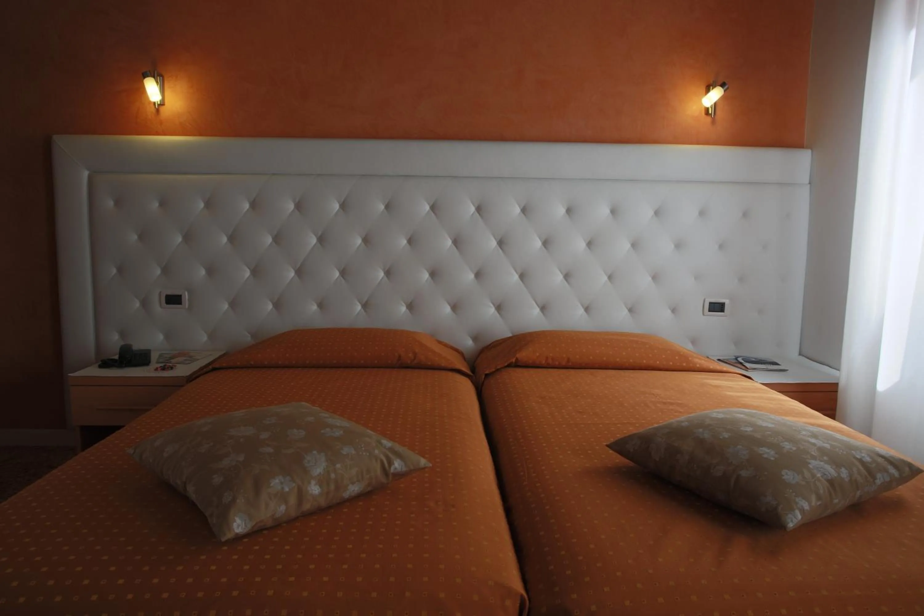 Bed in Hotel Roma
