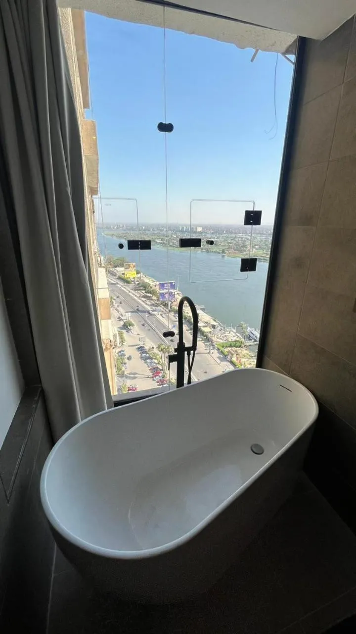 Nile and pyramids view 4BR apt