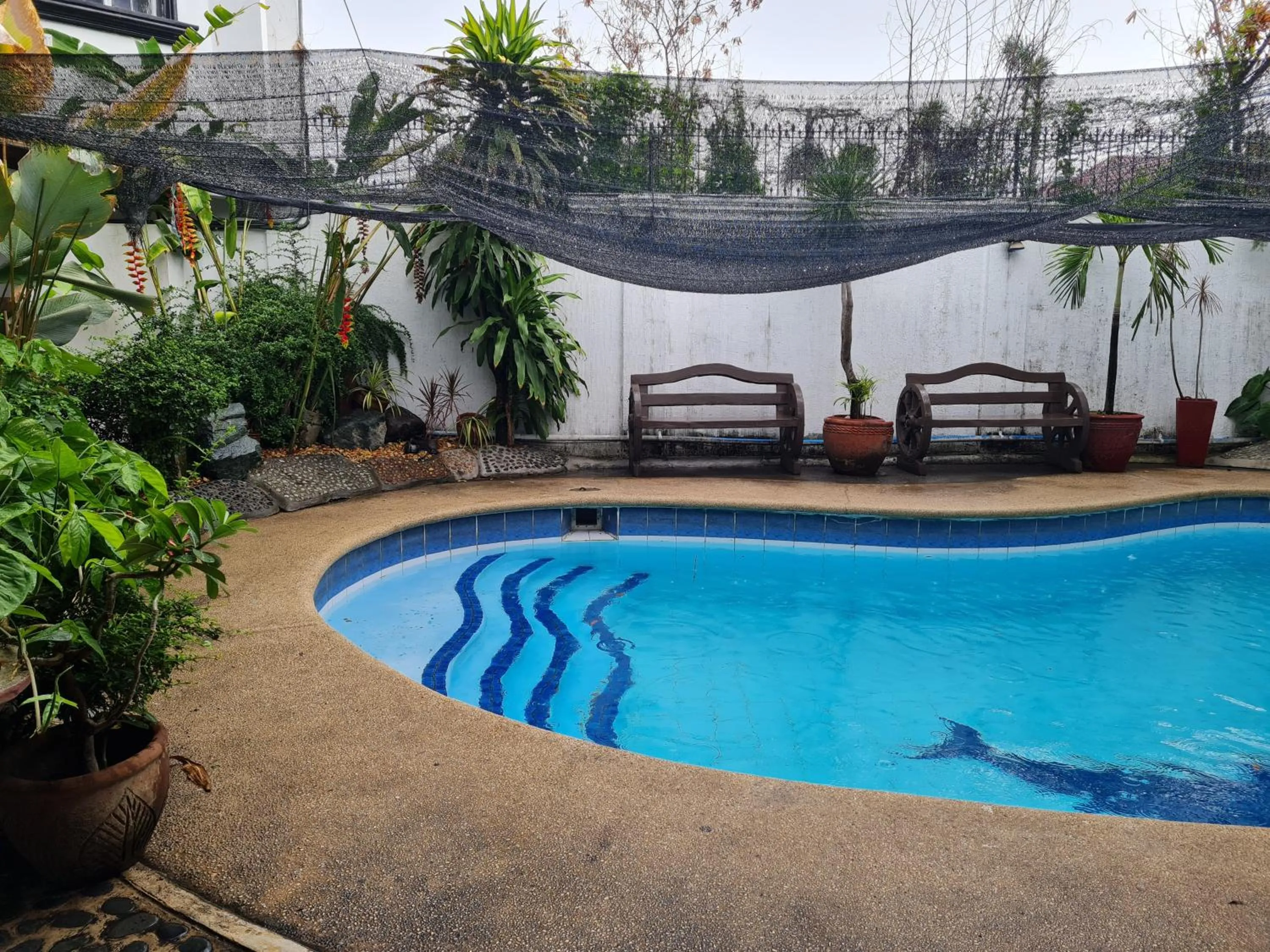 Swimming pool in Casa Eliana Garden Villa by SMS Hospitality