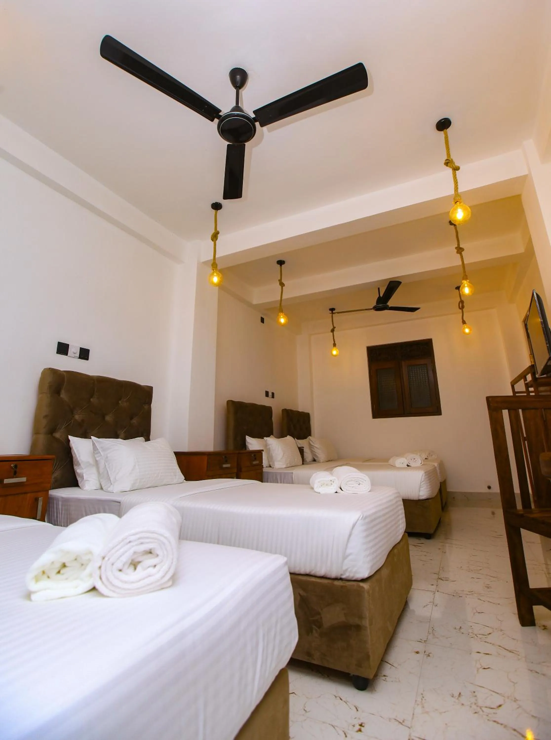 Bed in Sakura Surf Lanka Hotel & Restaurant