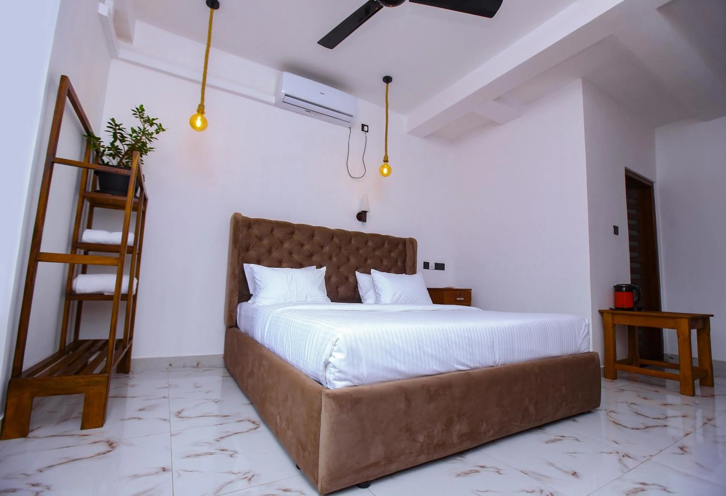 Photo of the whole room, Bed in Sakura Surf Lanka Hotel & Restaurant
