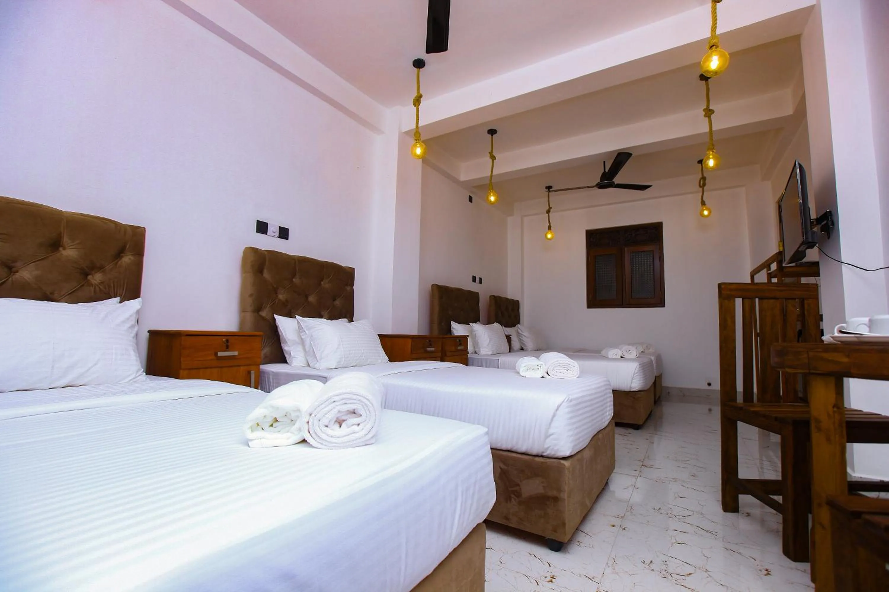 Photo of the whole room, Bed in Sakura Surf Lanka Hotel & Restaurant