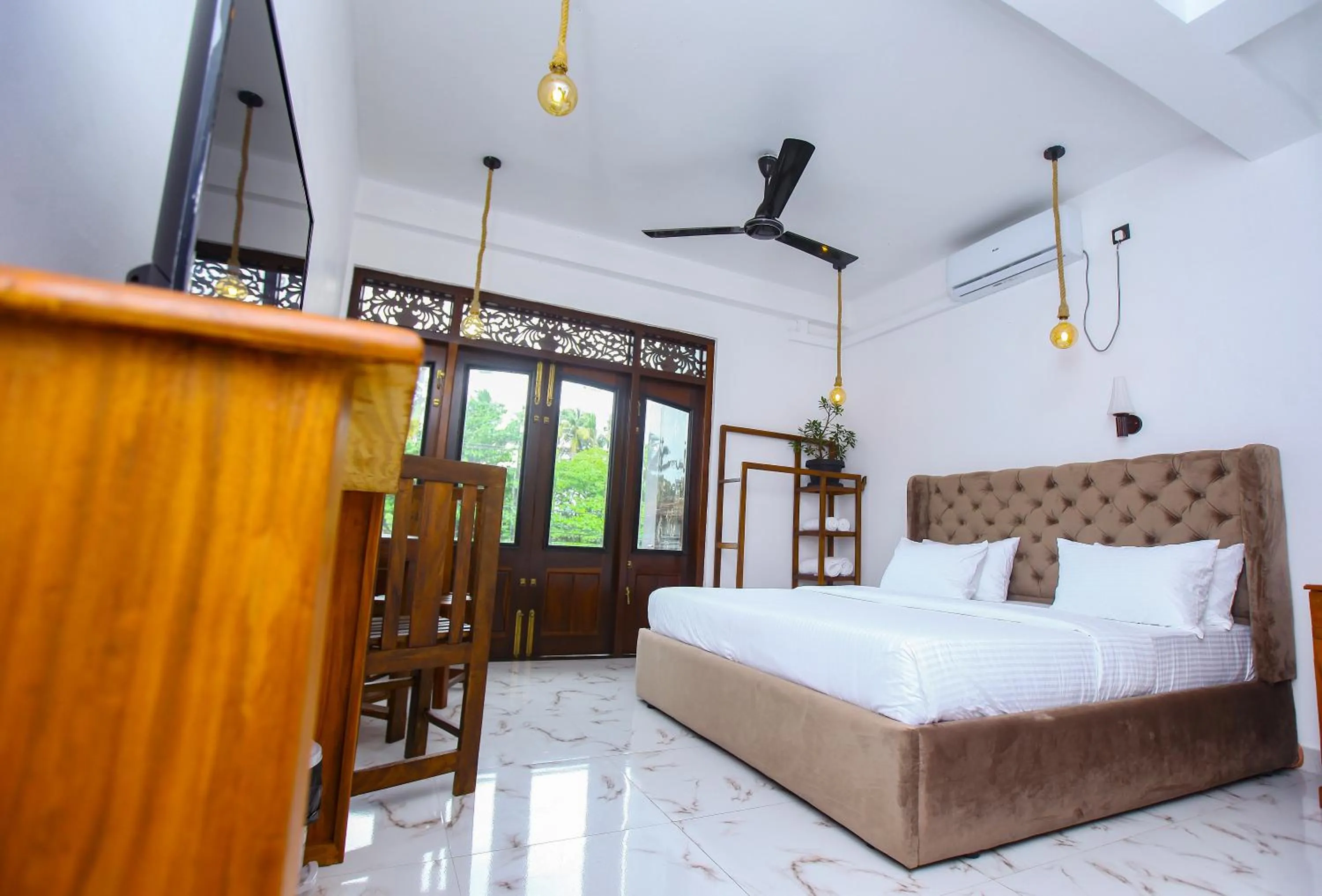 Bed in Sakura Surf Lanka Hotel & Restaurant