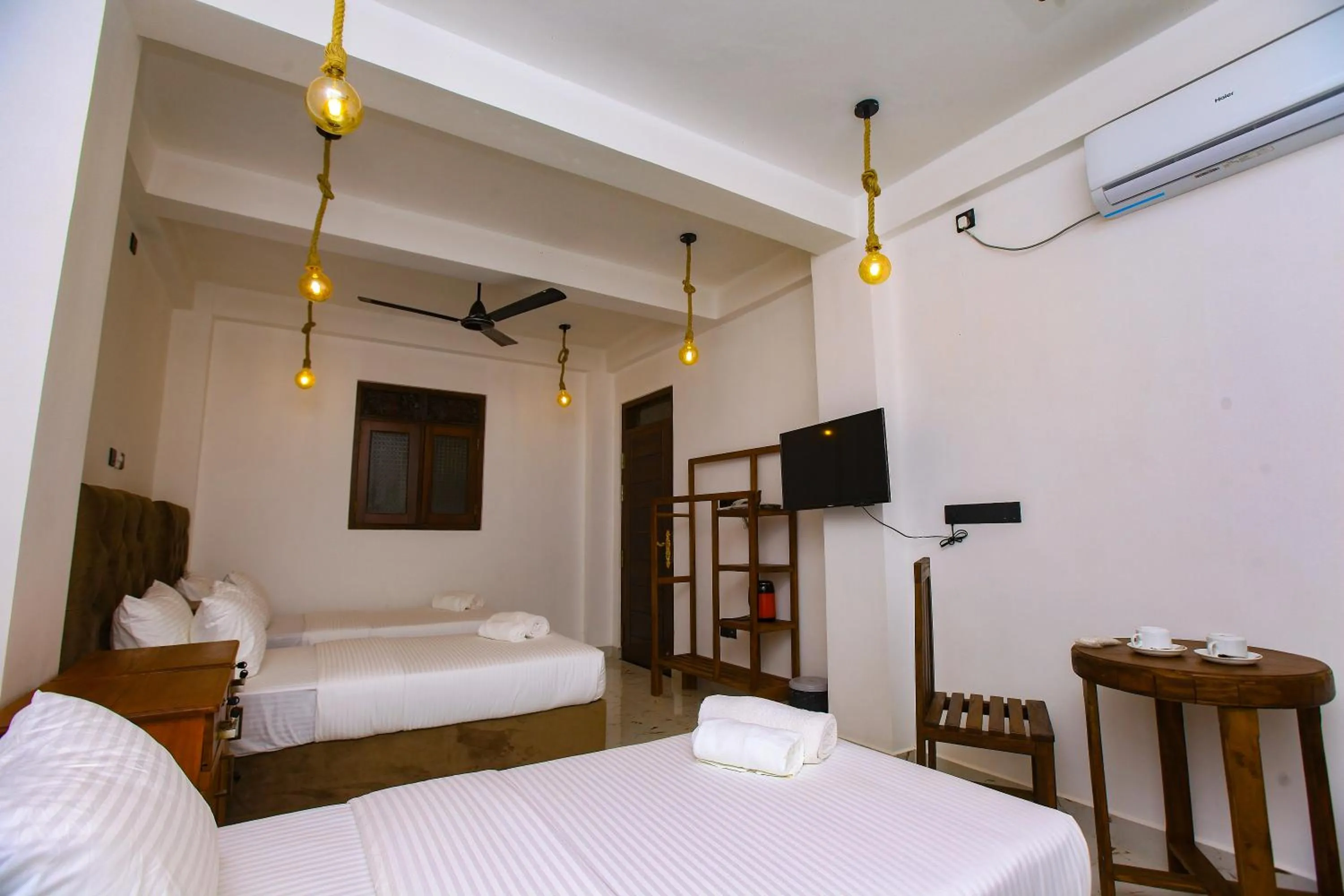 Bed in Sakura Surf Lanka Hotel & Restaurant