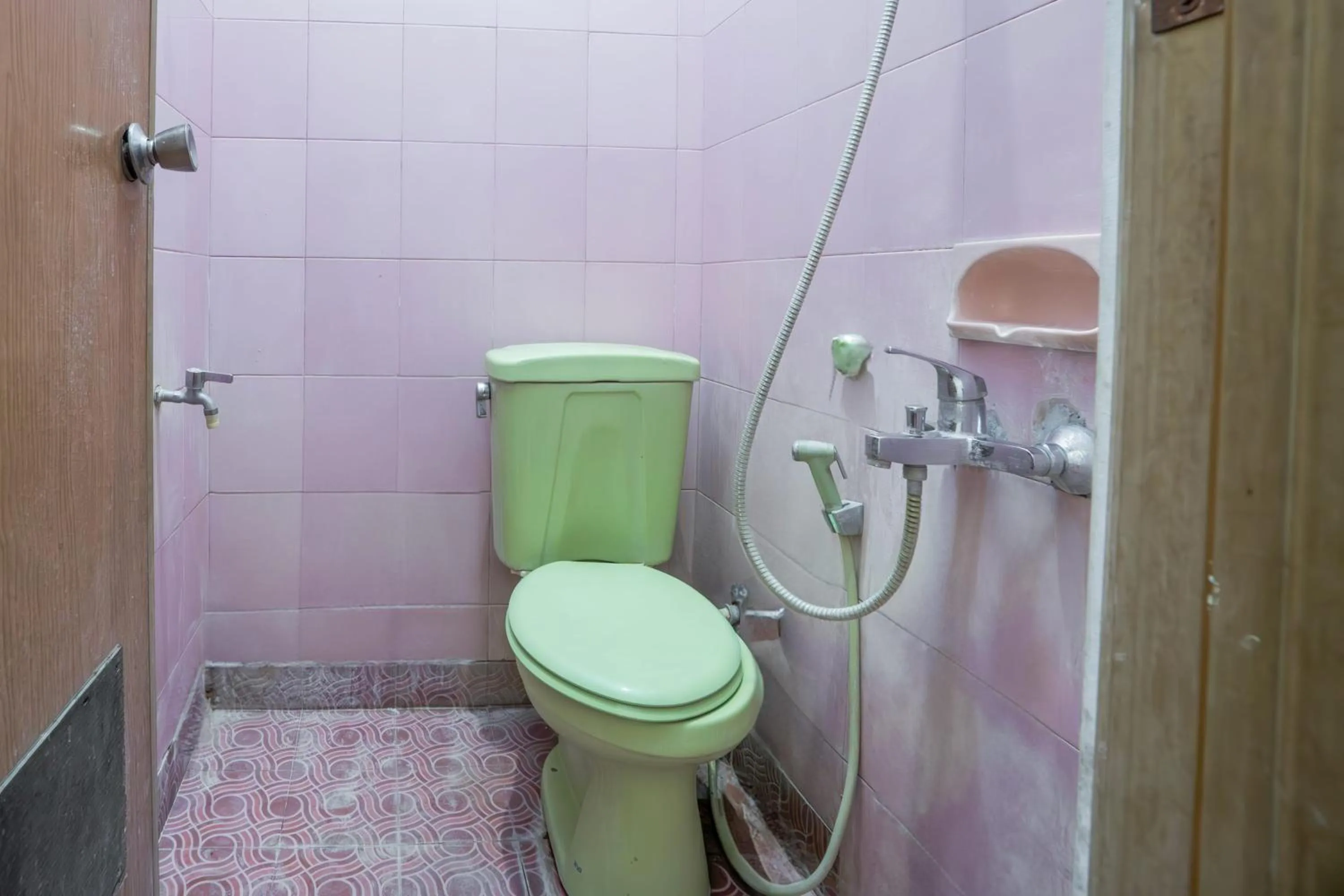 Bedroom in Hotel O Central Madiun Near Stasiun Kota Madiun