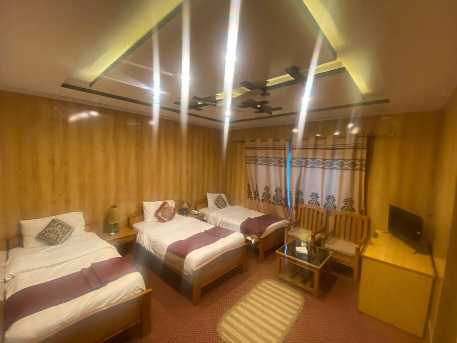 Bed in Hotel Blangsa Indus View