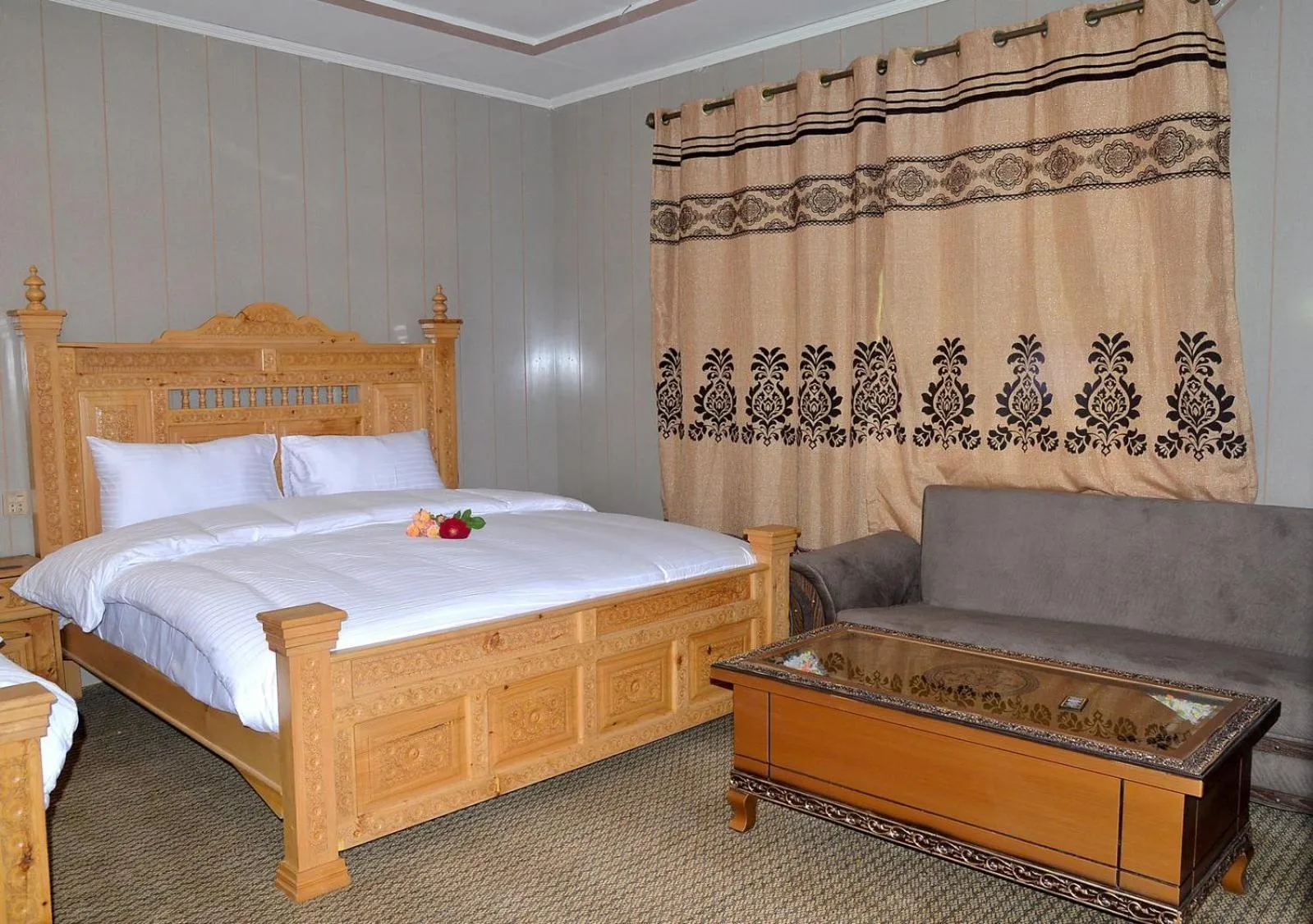 Bed in Hotel Blangsa Indus View