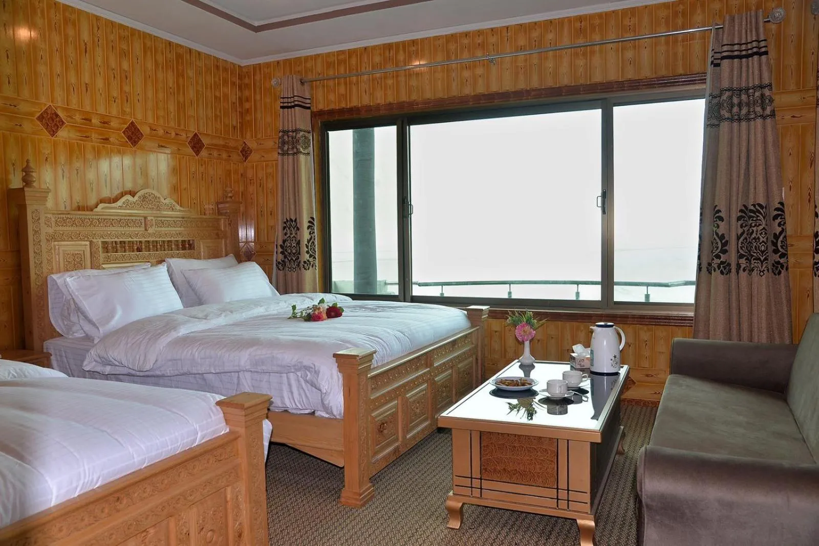 Bed in Hotel Blangsa Indus View