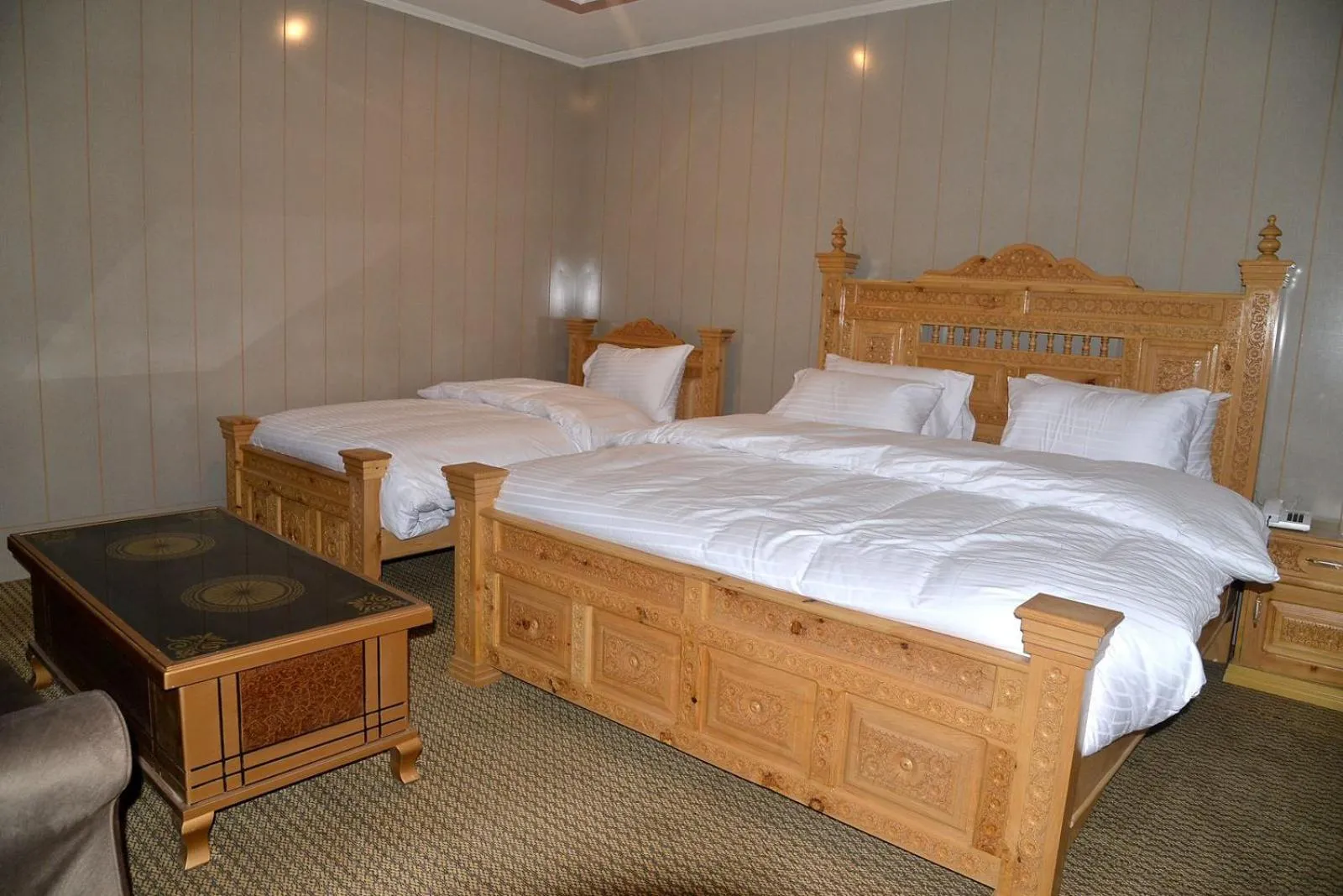 Bed in Hotel Blangsa Indus View