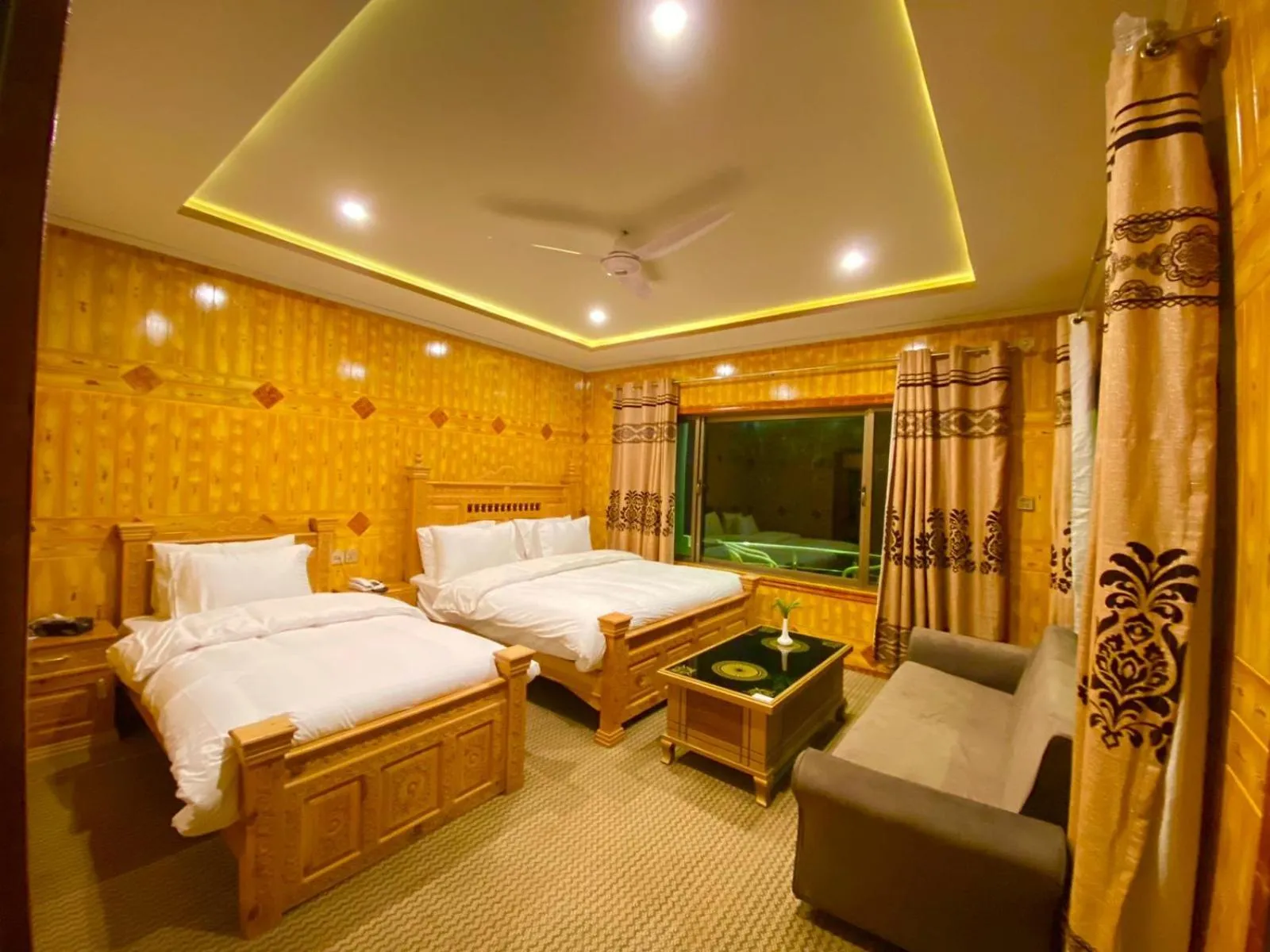 Bed in Hotel Blangsa Indus View