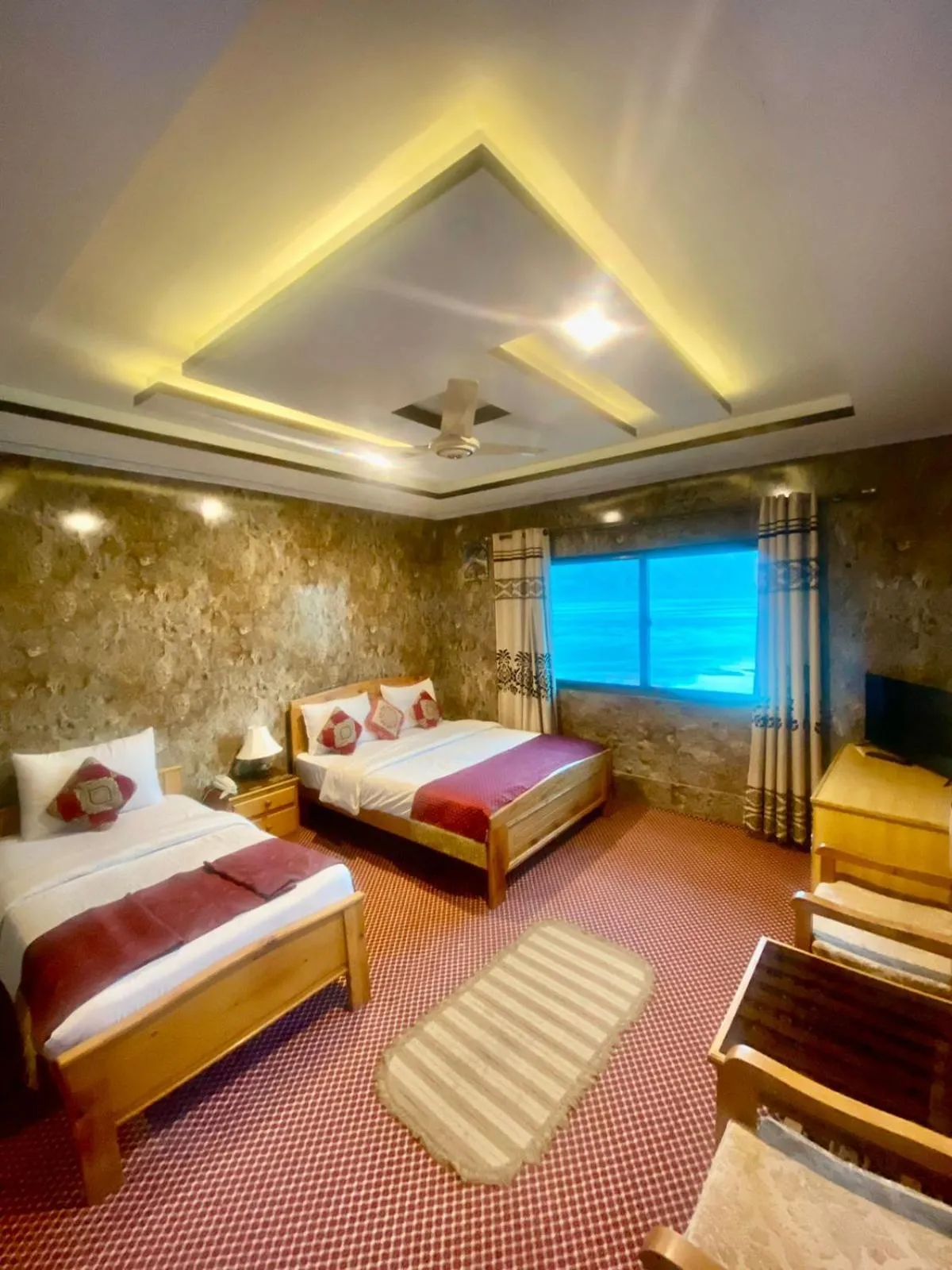Bed in Hotel Blangsa Indus View