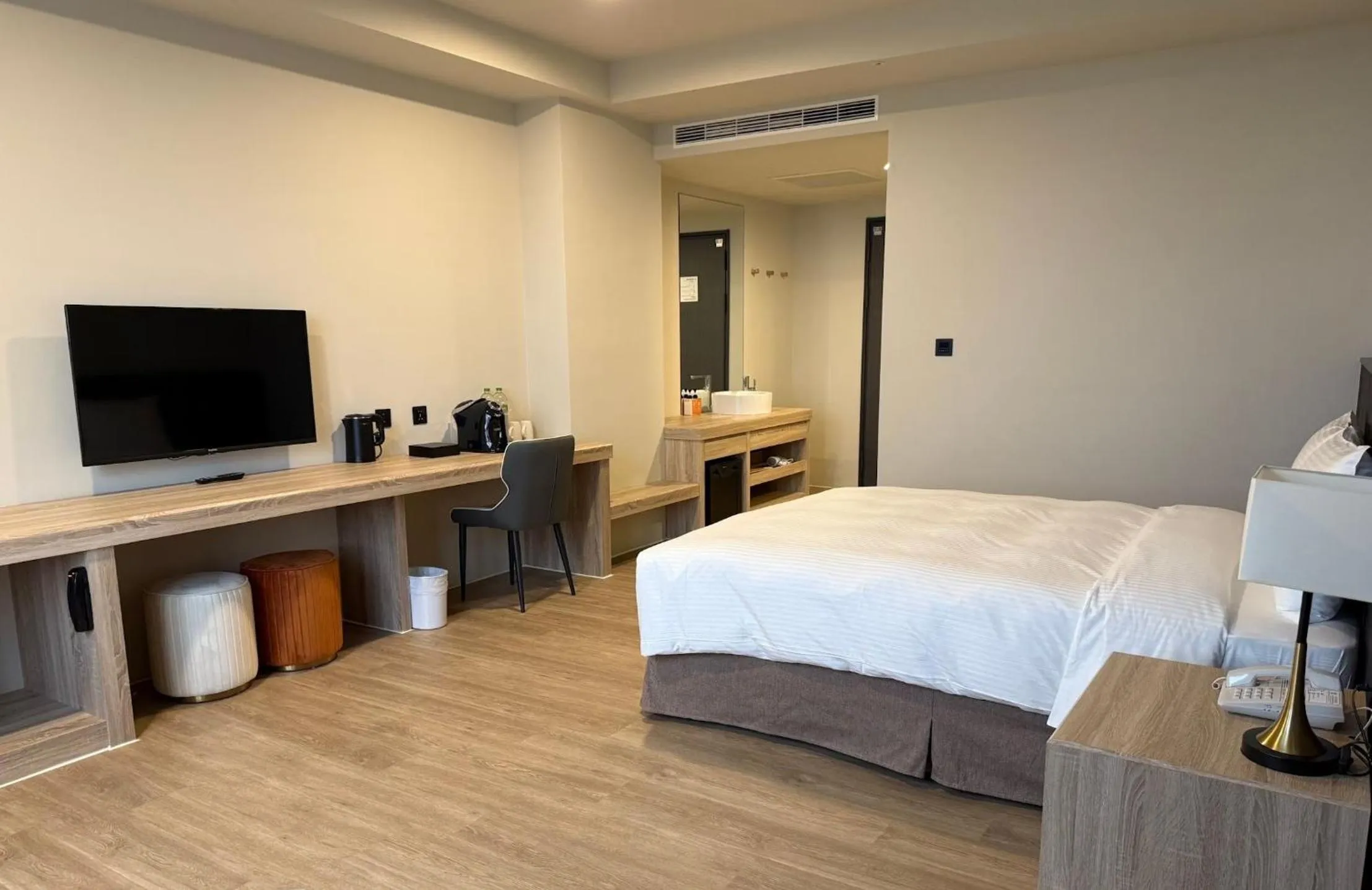 Bed in Floramos Hotel