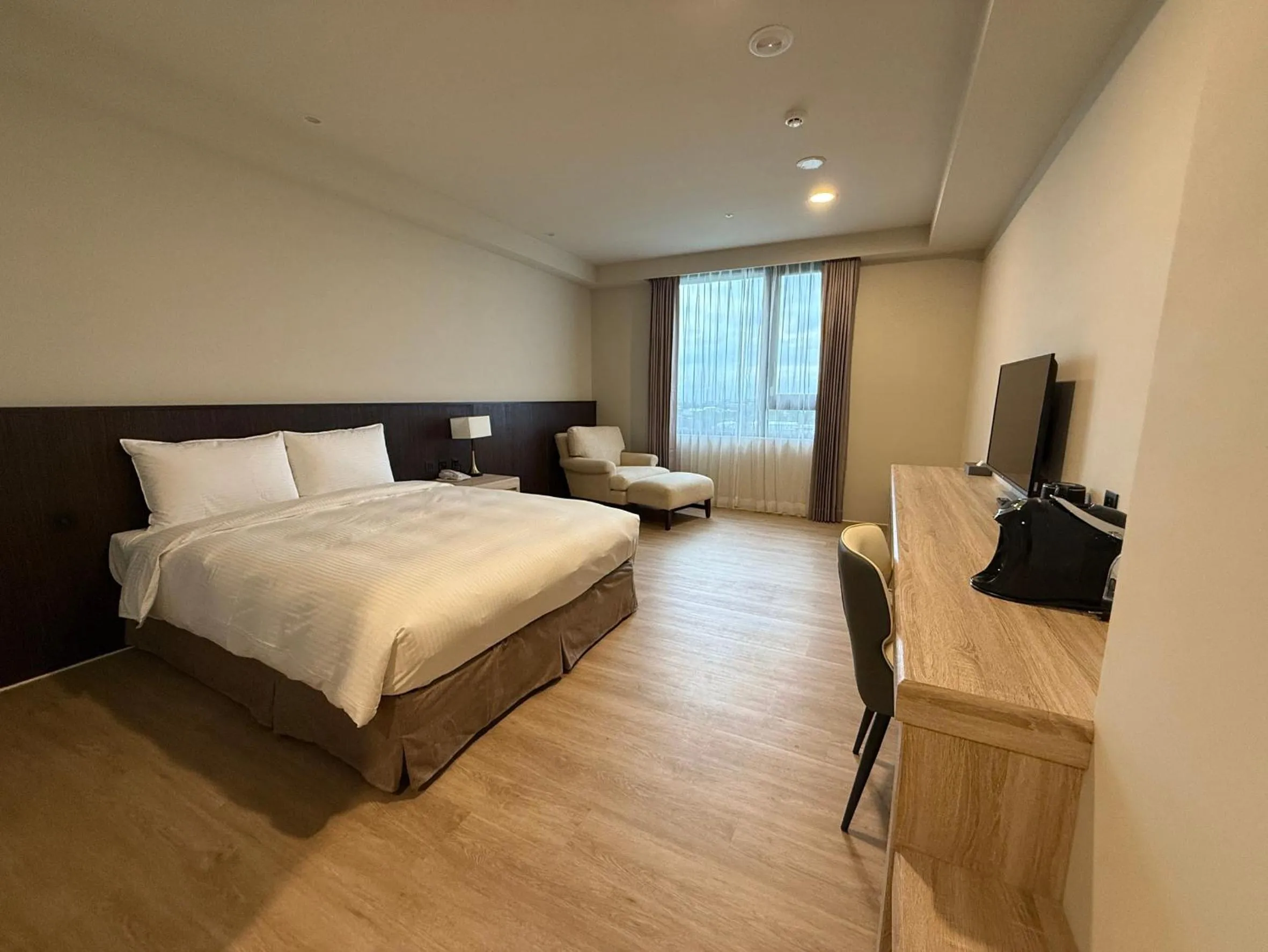 Bed in Floramos Hotel