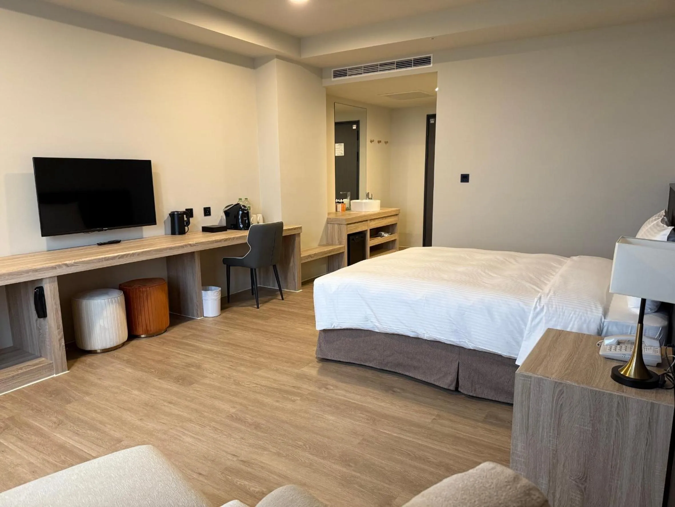 Bed in Floramos Hotel