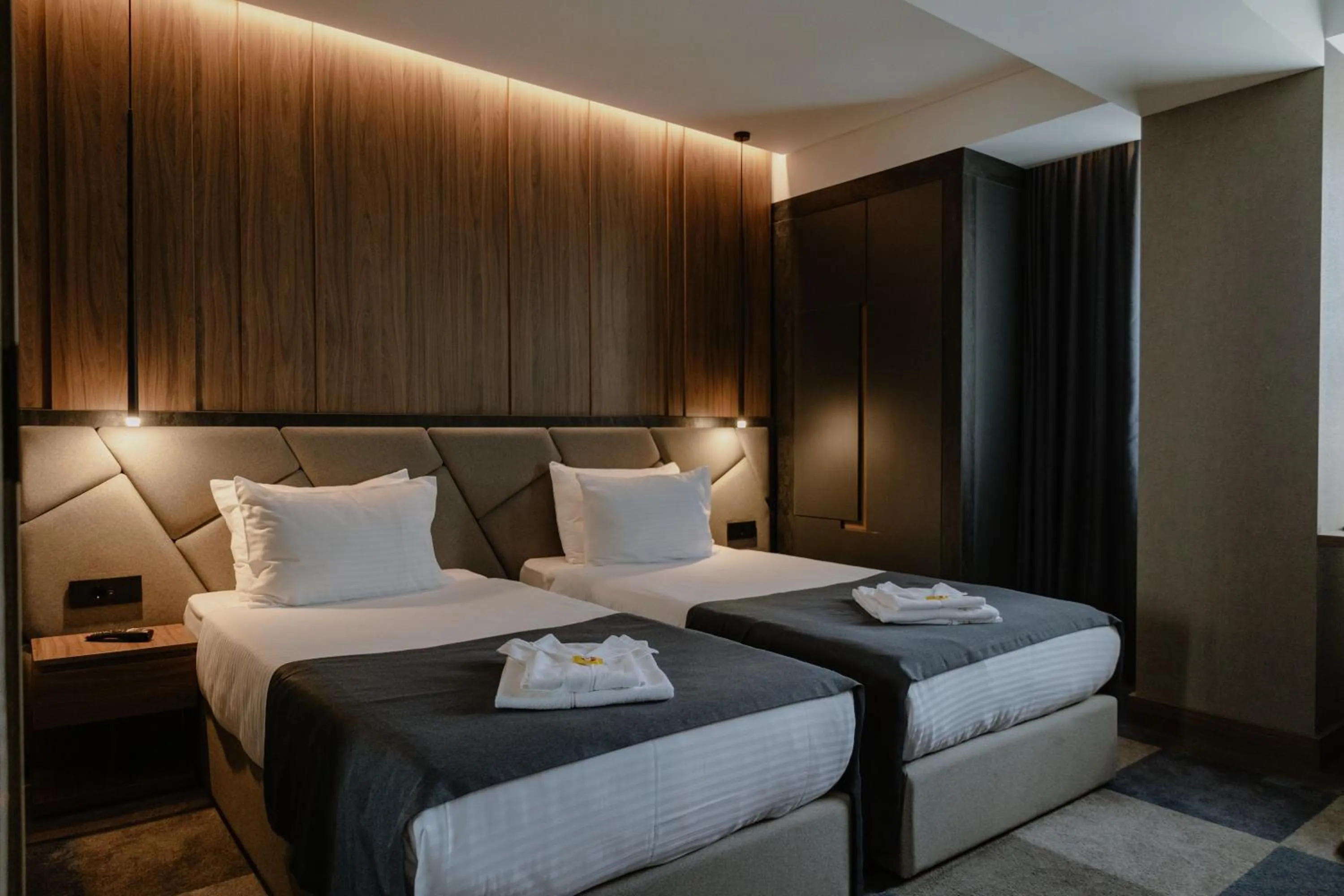 Bed in Lumière Hotel Pool & SPA