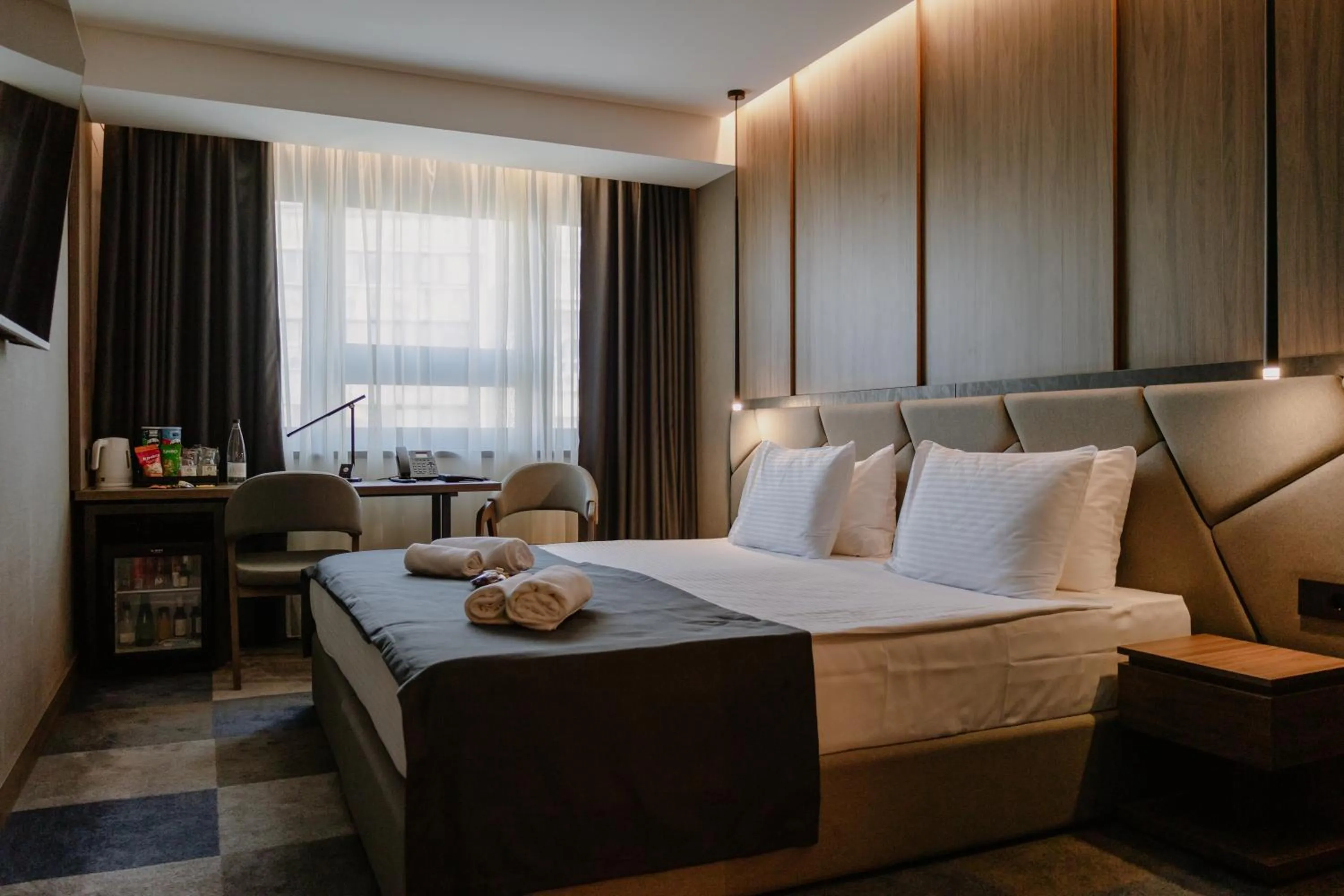 View (from property/room), Bed in Lumière Hotel Pool & SPA