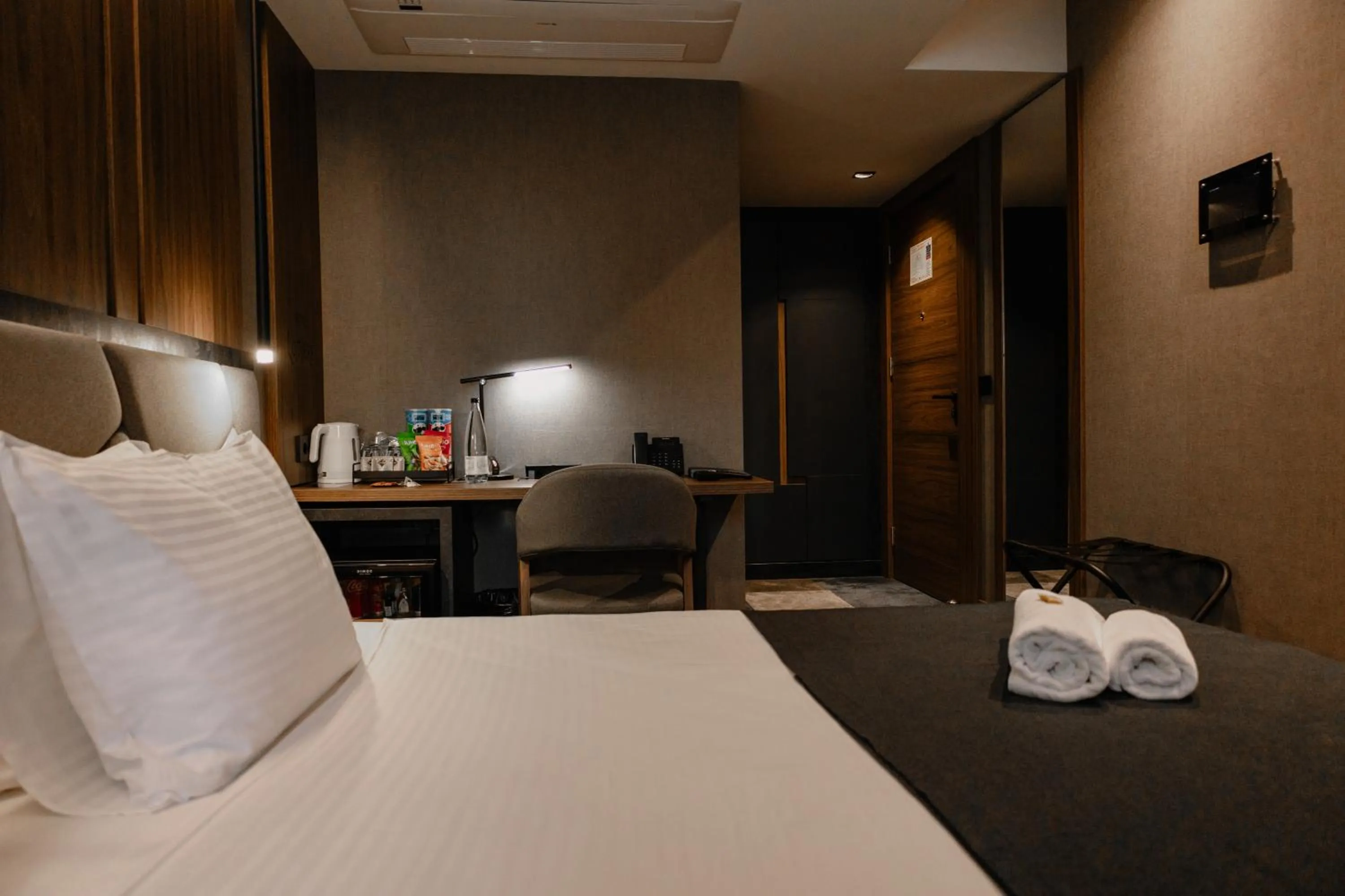 Bed in Lumière Hotel Pool & SPA