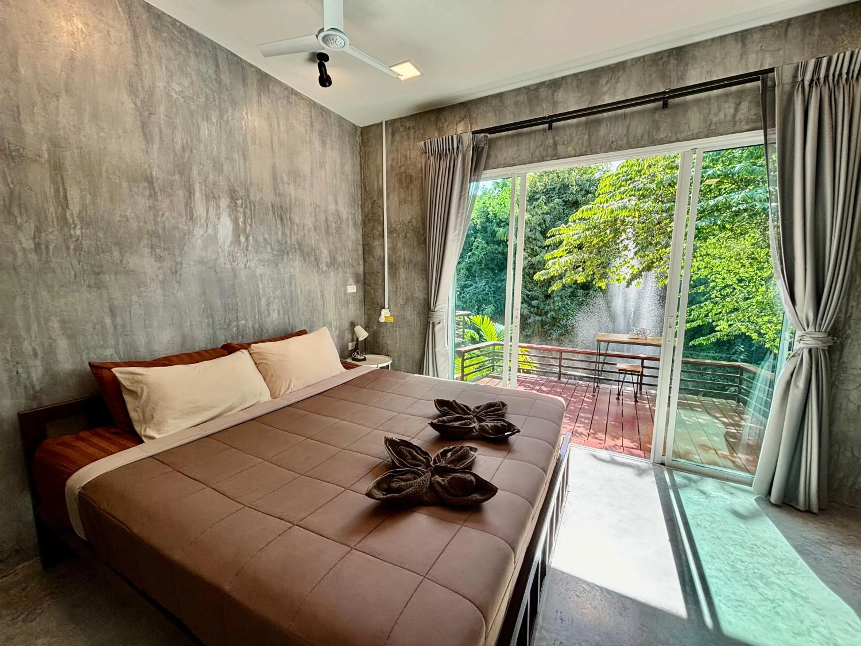 Photo of the whole room, Bed in BAAN APA ERAWAN Resort