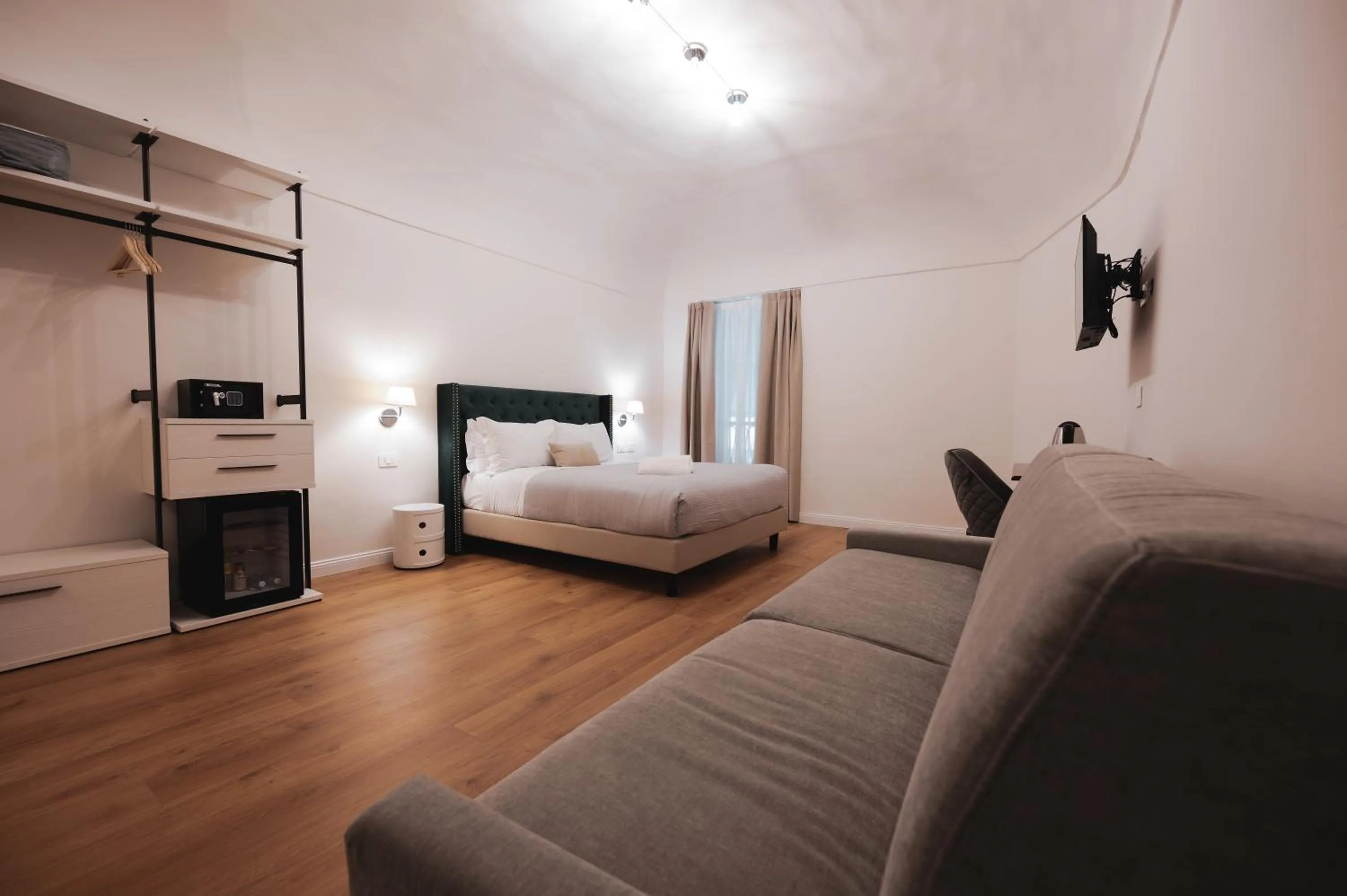 Photo of the whole room, Bed in Carlo Felice Boutique Hotel