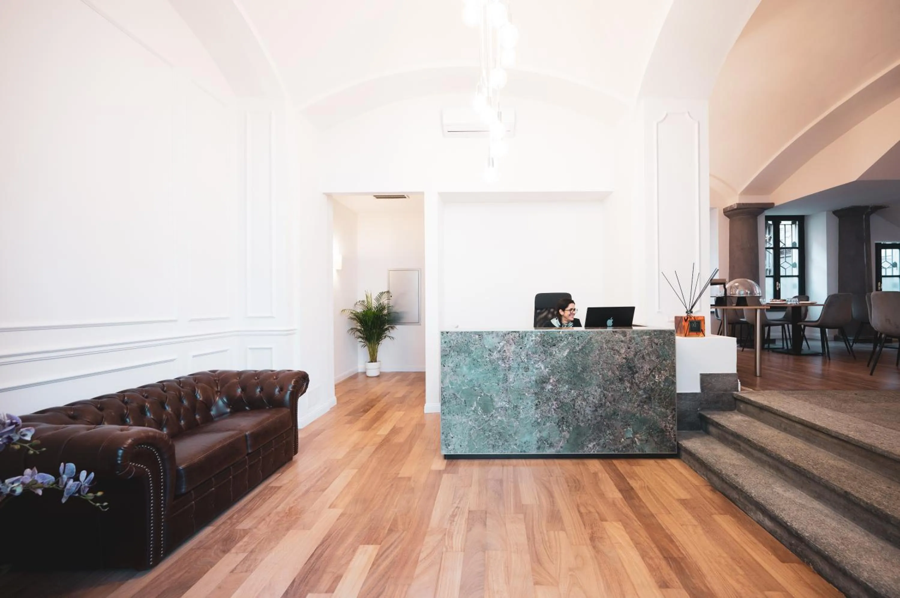 Lobby or reception in Carlo Felice Boutique Hotel