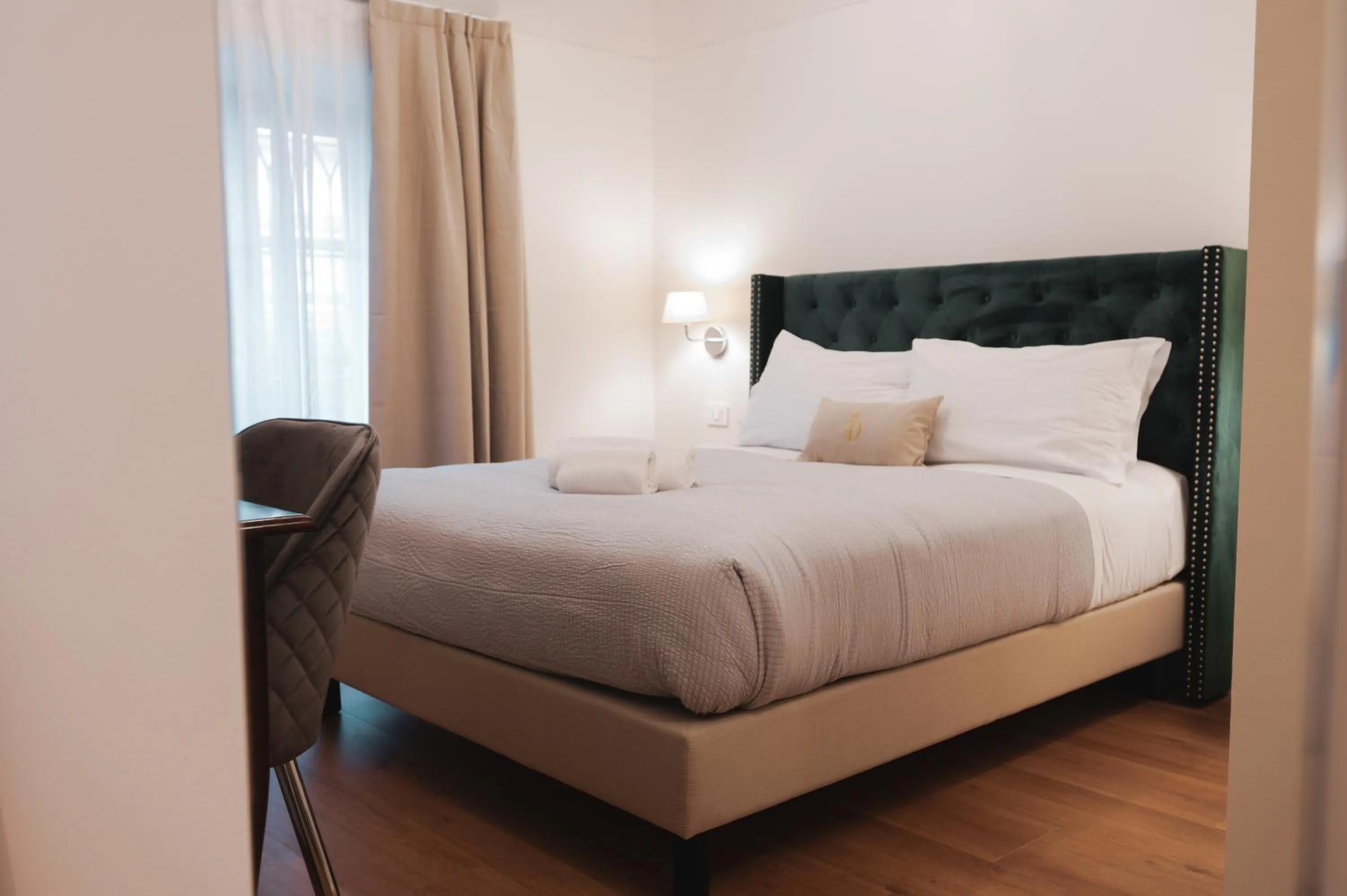 Photo of the whole room, Bed in Carlo Felice Boutique Hotel