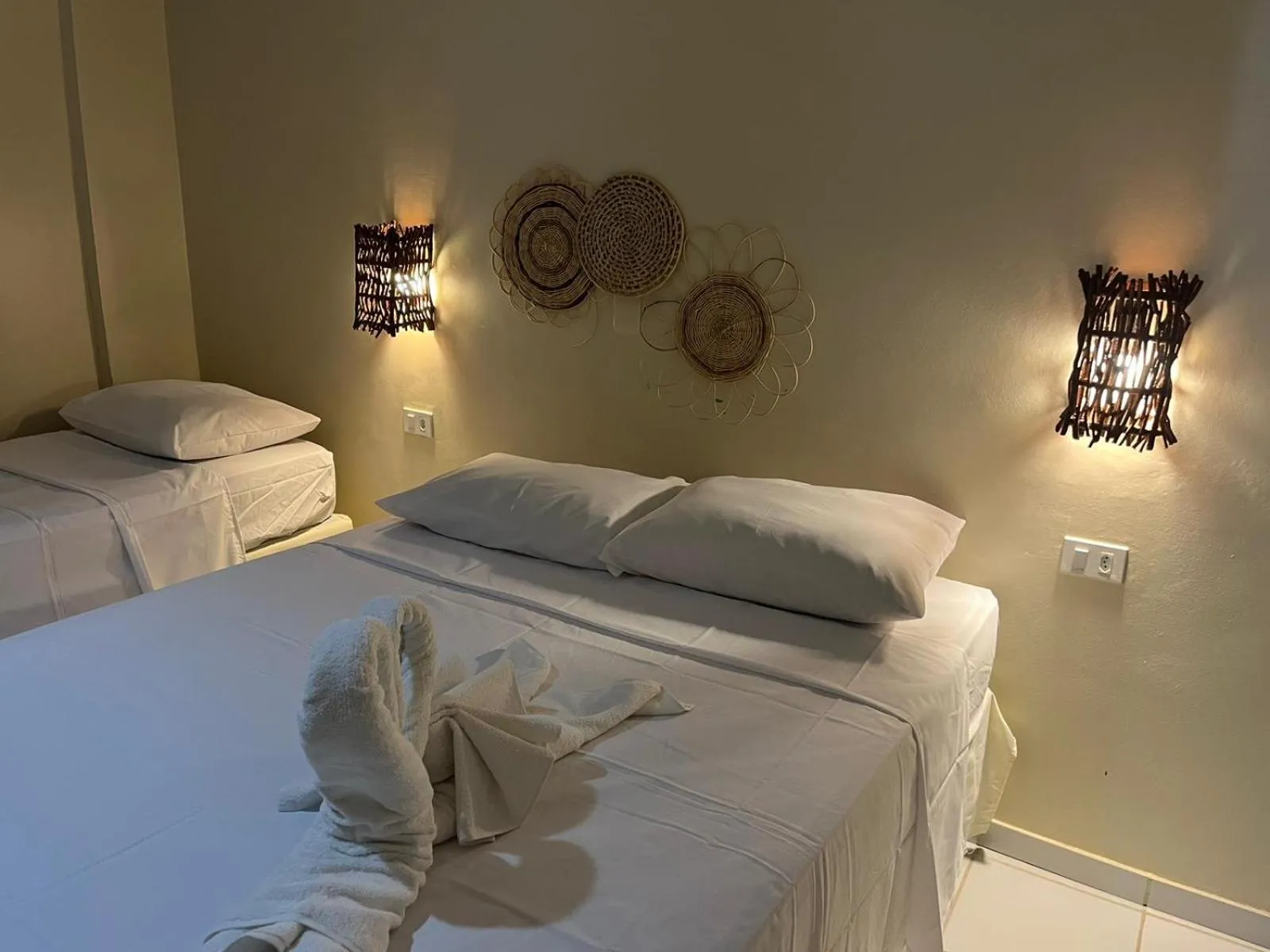 Bed in Pousada Flor de Merepe