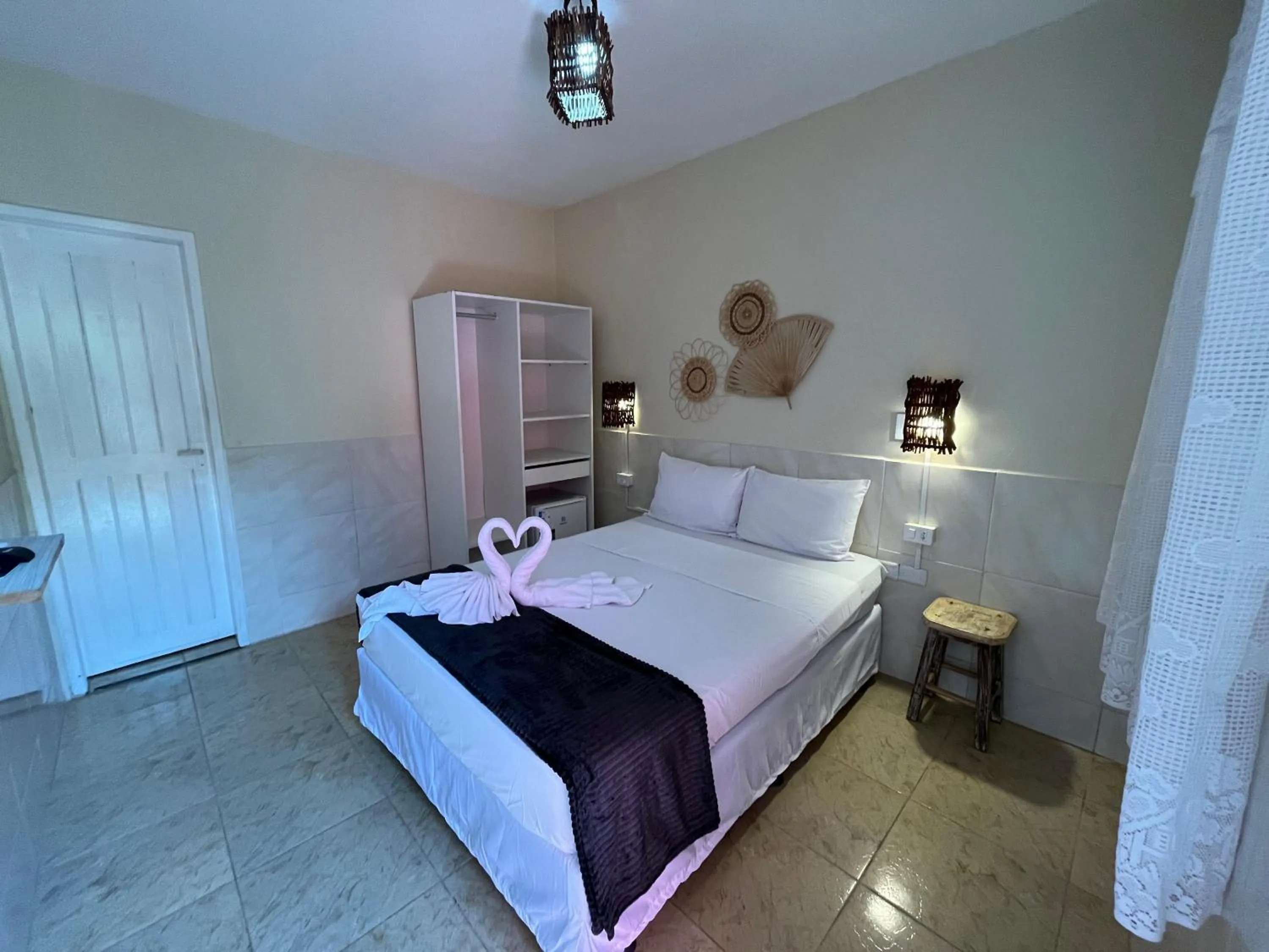 Bed in Pousada Flor de Merepe