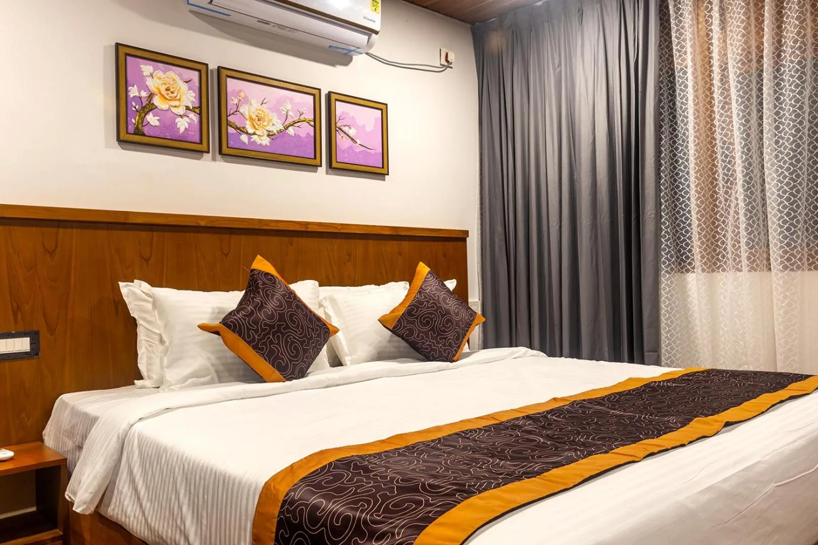 Bed in SandalMist Resort and Spa