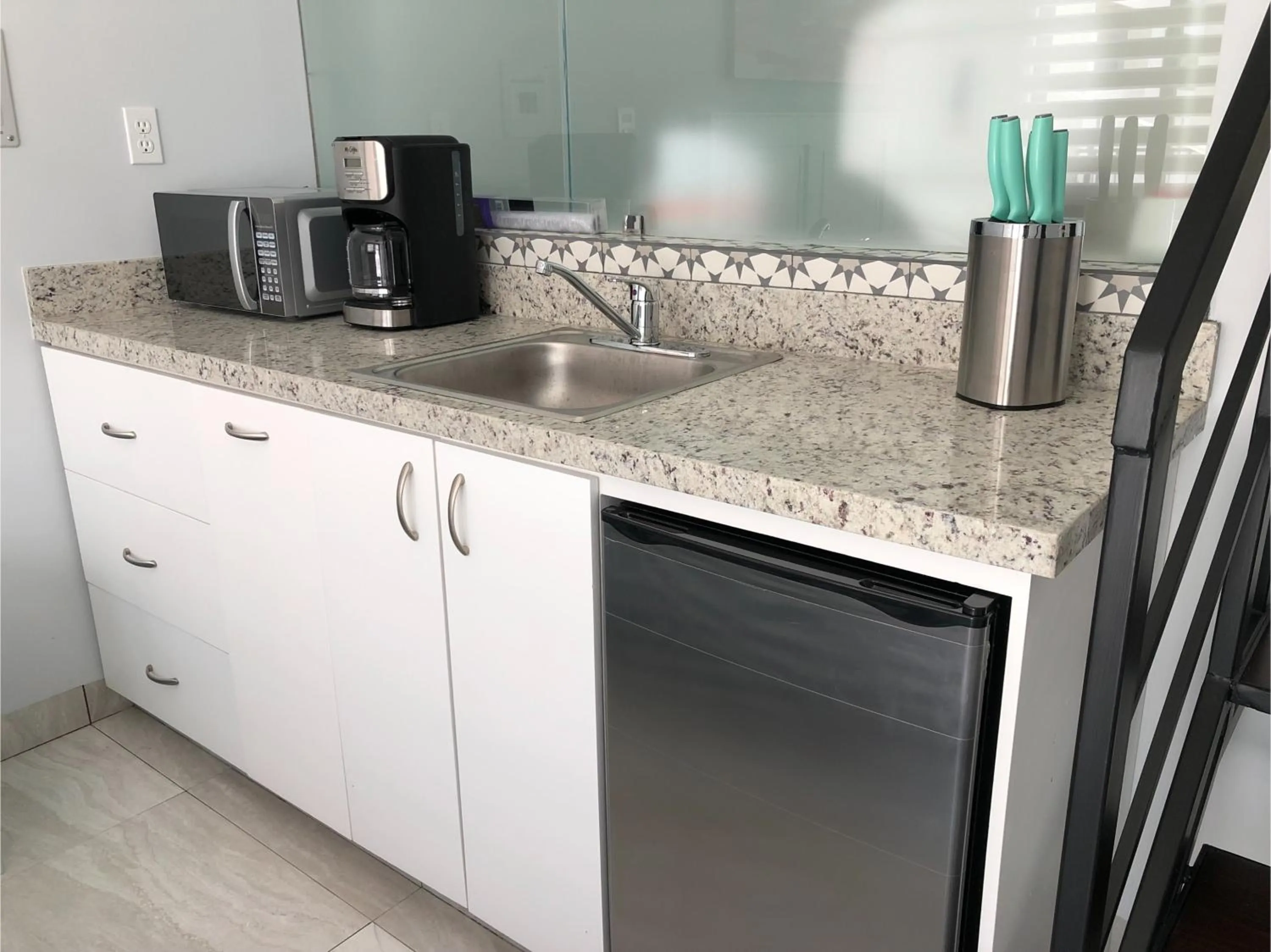 Kitchen or kitchenette in Collection O Morgan City Center, Los Cabos