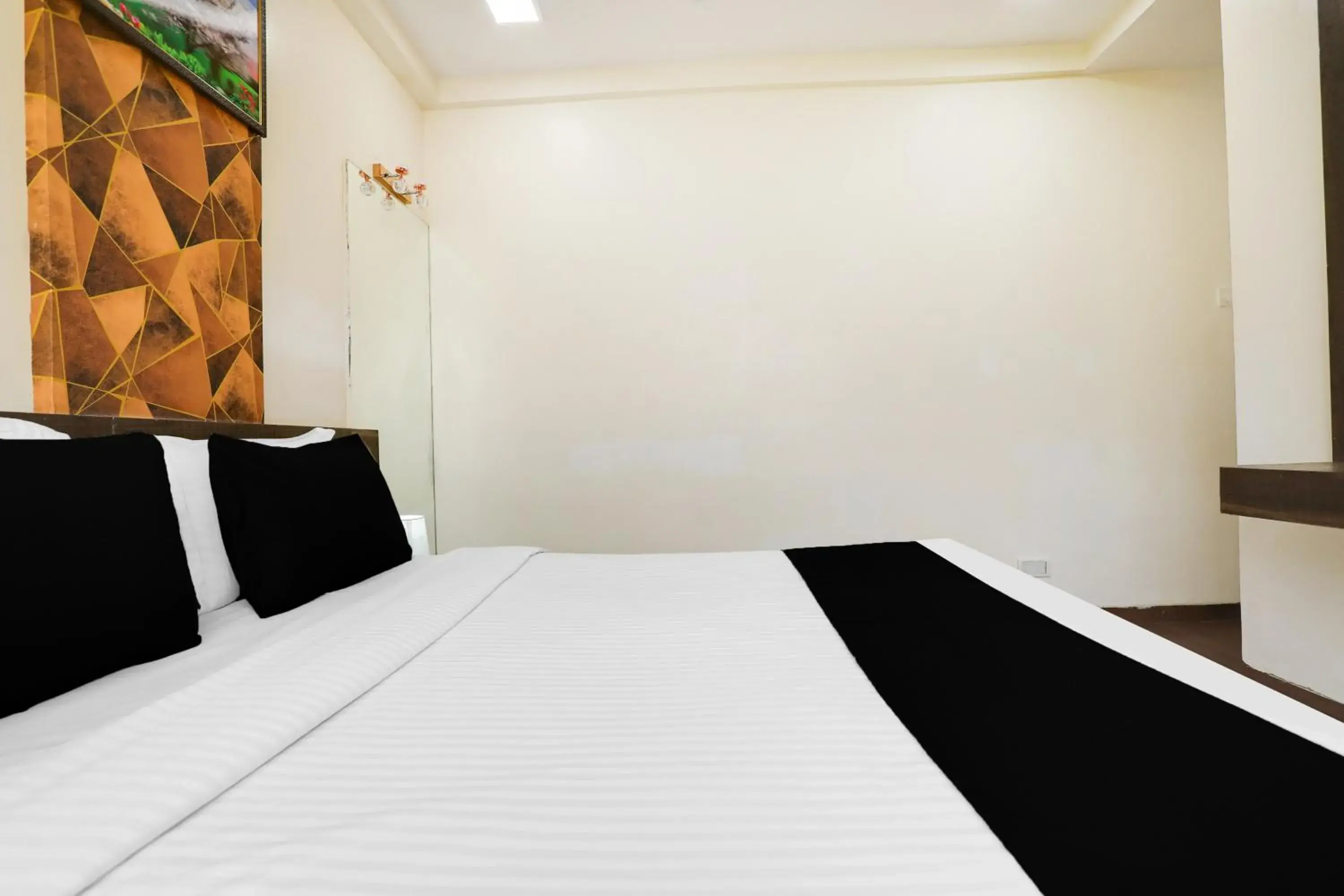 Bedroom, Bed in Super Hotel O Palkhi Road Near Sai Baba Temple Formerly Netra Sai Bedroom, Bed in Super Hotel O Palkhi Road Near Sai Baba Temple Formerly Netra Sai