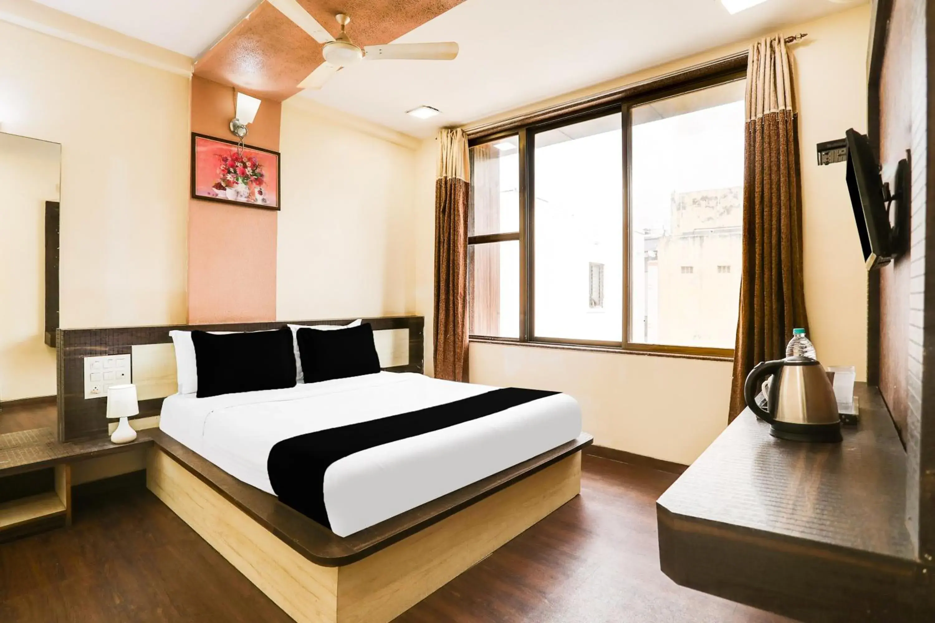 Bedroom, Bed in Super Hotel O Palkhi Road Near Sai Baba Temple Formerly Netra Sai Bedroom, Bed in Super Hotel O Palkhi Road Near Sai Baba Temple Formerly Netra Sai