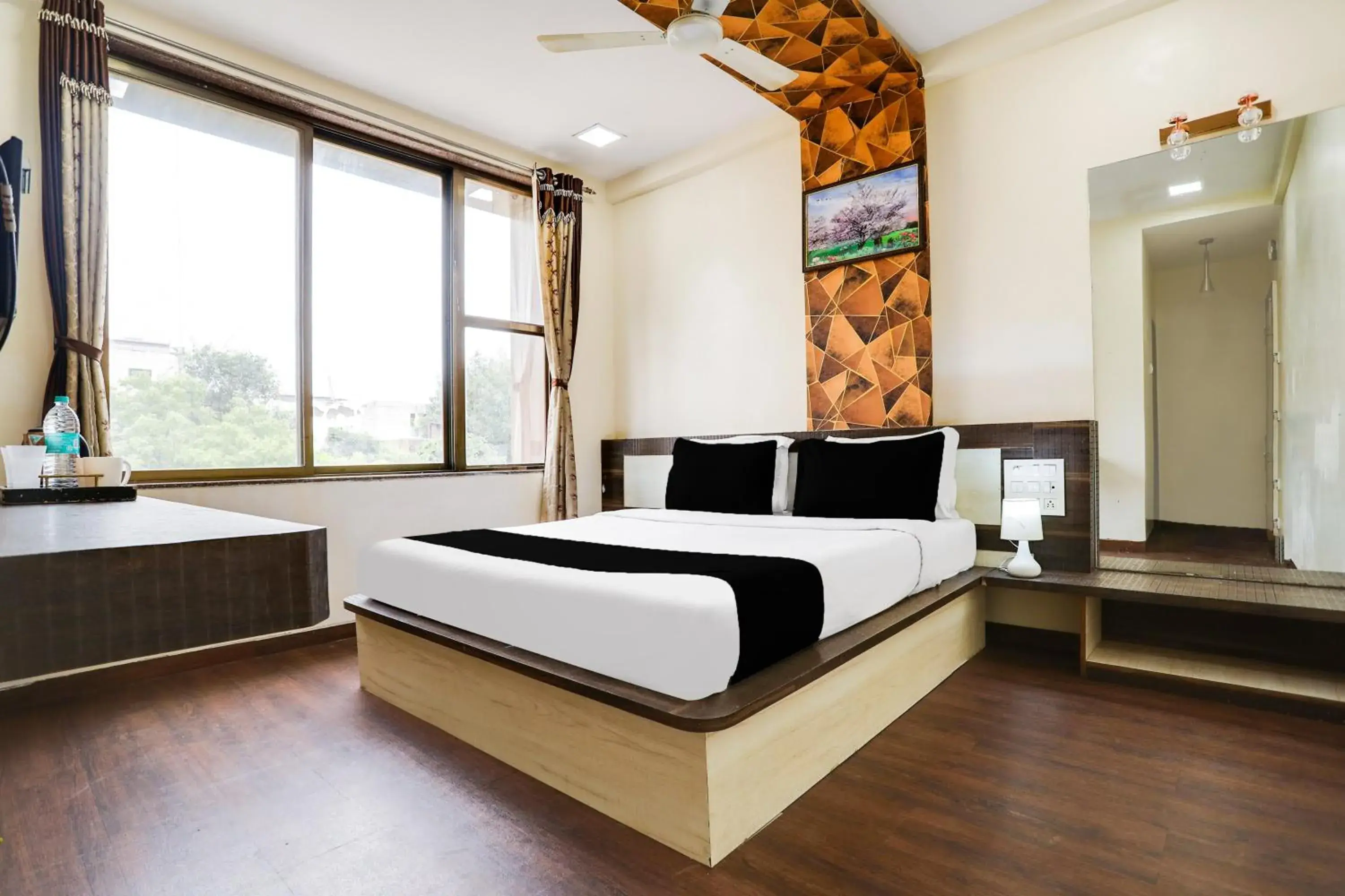 Bedroom, Bed in Super Hotel O Palkhi Road Near Sai Baba Temple Formerly Netra Sai Bedroom, Bed in Super Hotel O Palkhi Road Near Sai Baba Temple Formerly Netra Sai