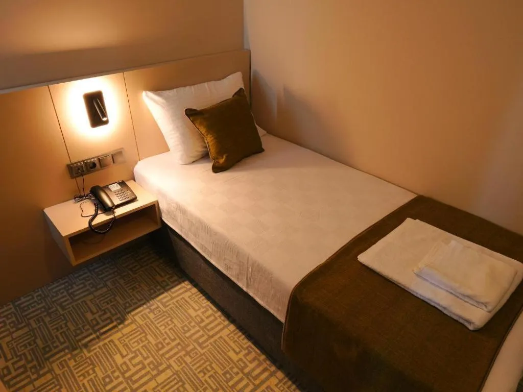 Bed in Bonnie City Hotel