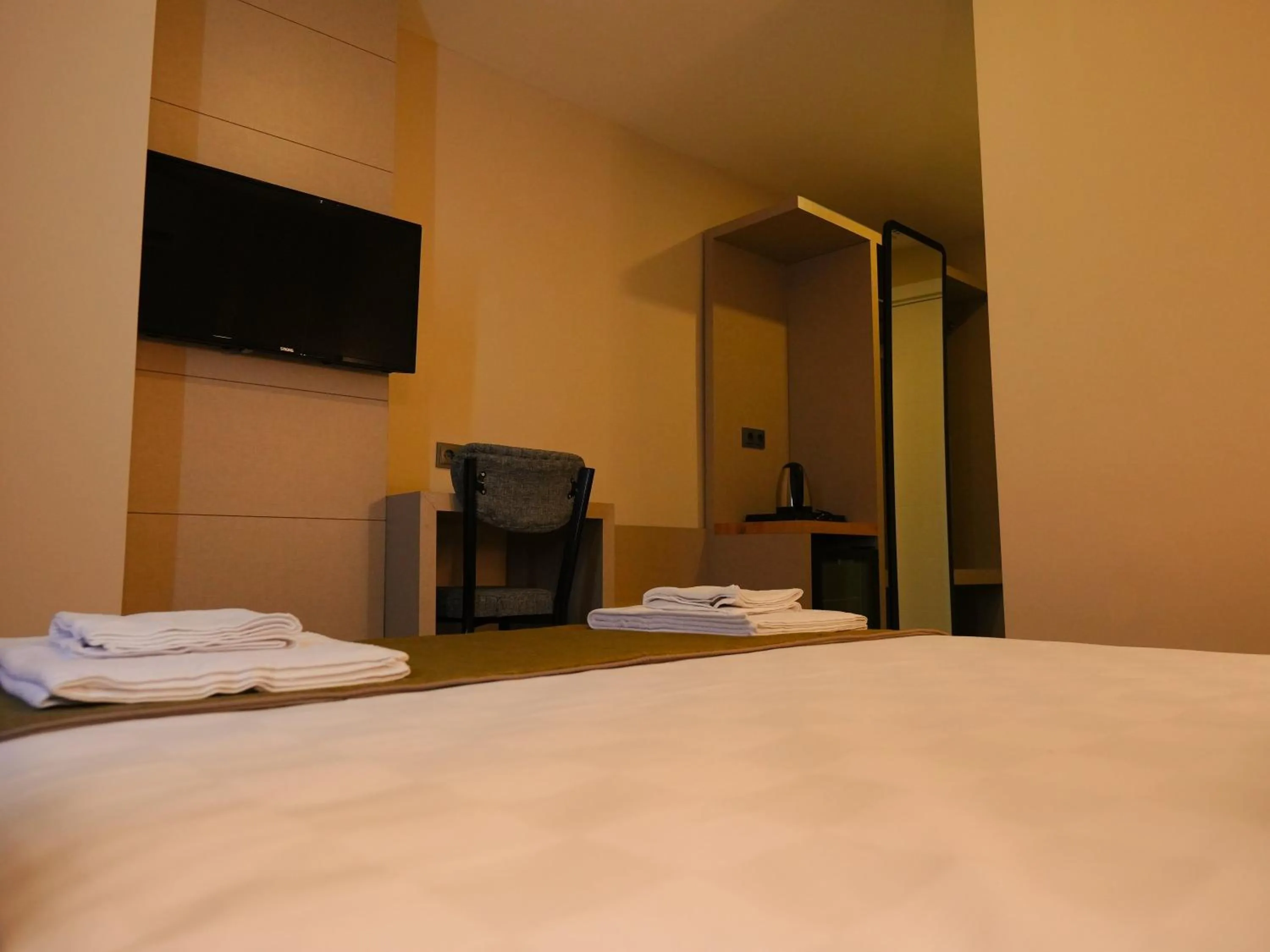 Bed in Bonnie City Hotel