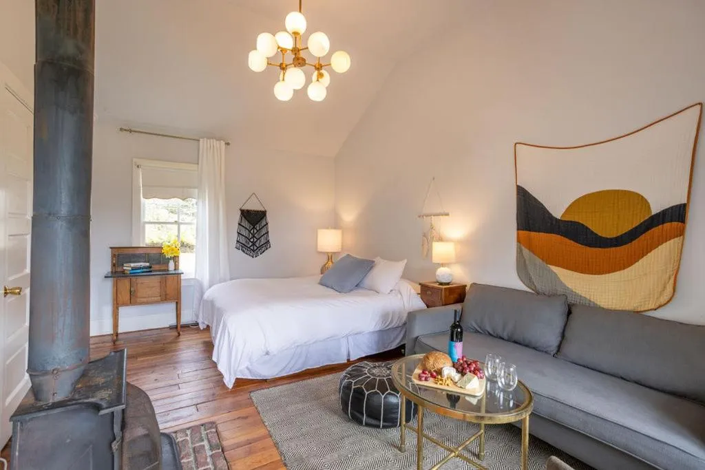 Bed in Dennen's Victorian Farmhouse