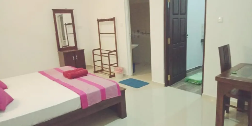 Bed in Hiru Resort Inn