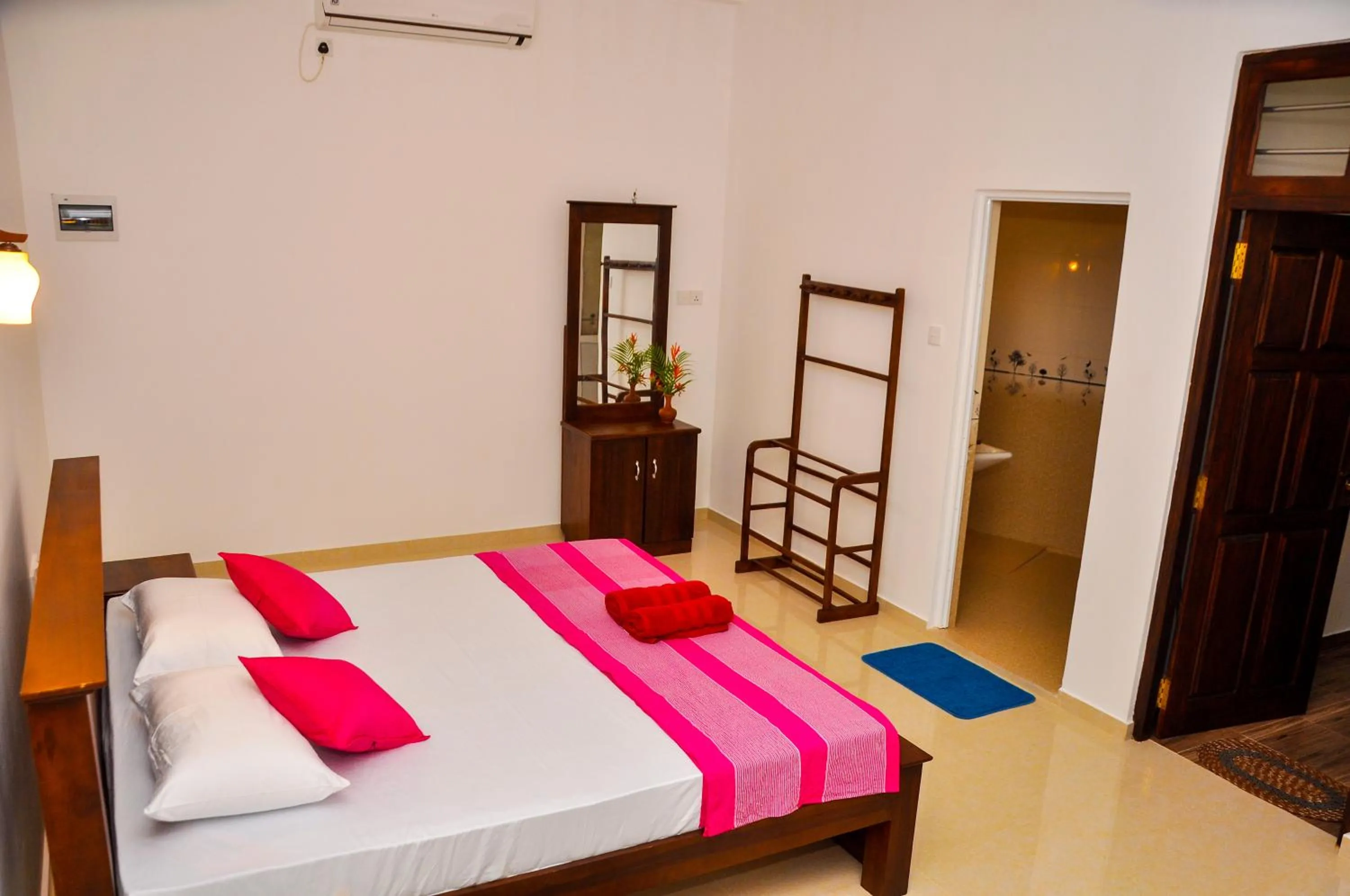 Bed in Hiru Resort Inn