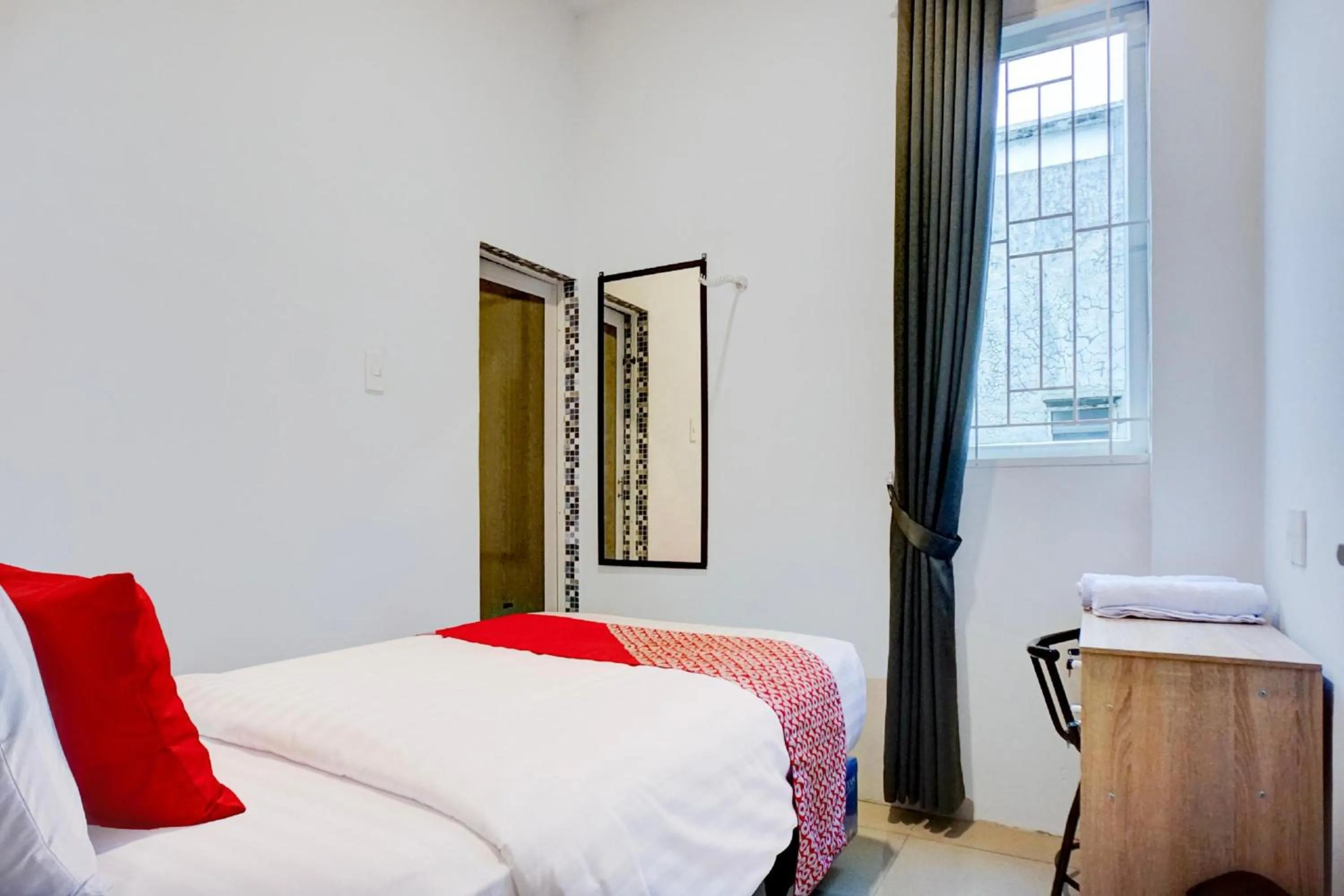 Photo of the whole room, Bed in Collection O Almasarra Residence Near Ring Road Medan