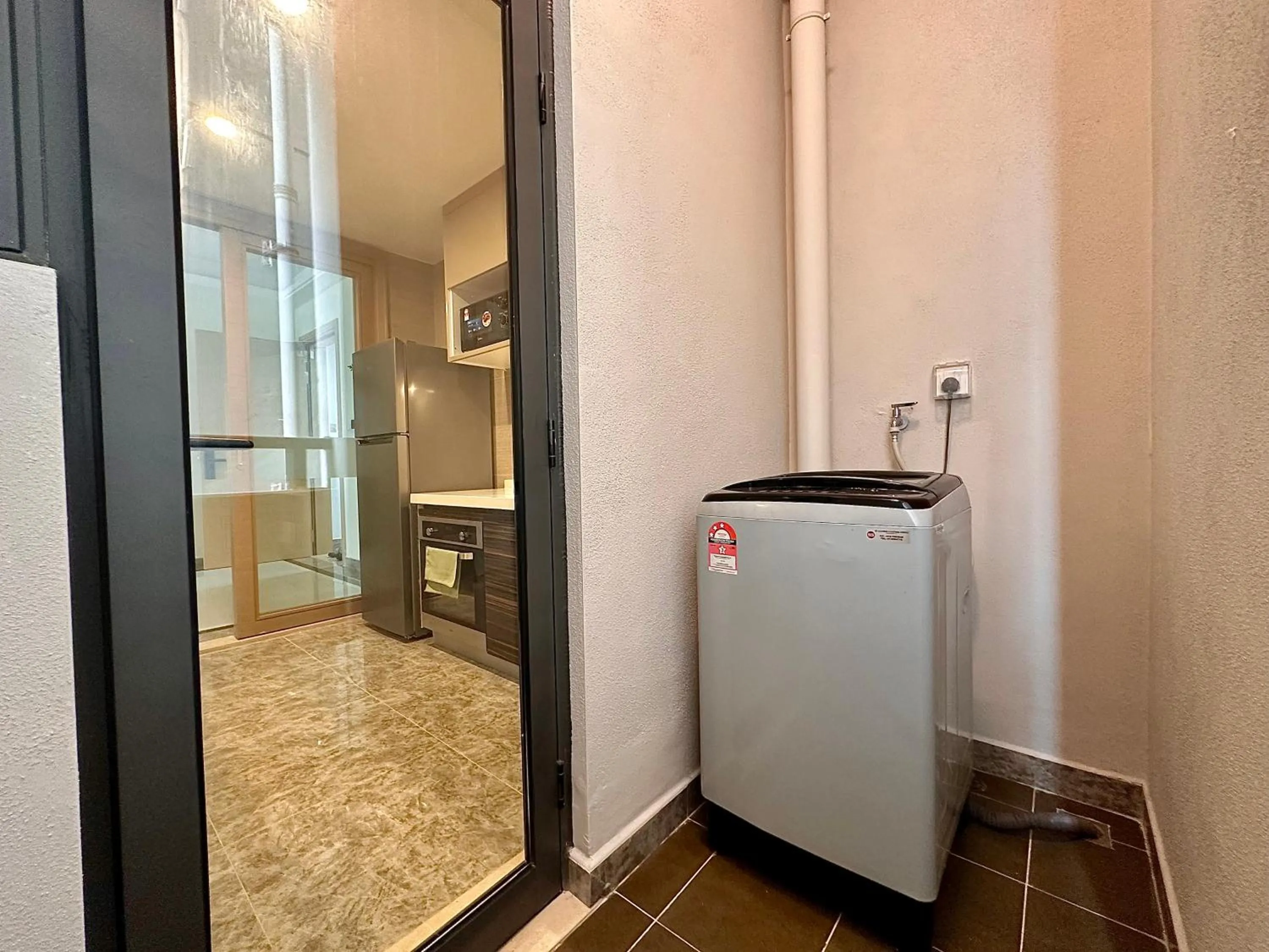 washing machine in R&F Princess Cove Superior Homestay Nearby CIQ By Han Lin Sojourn