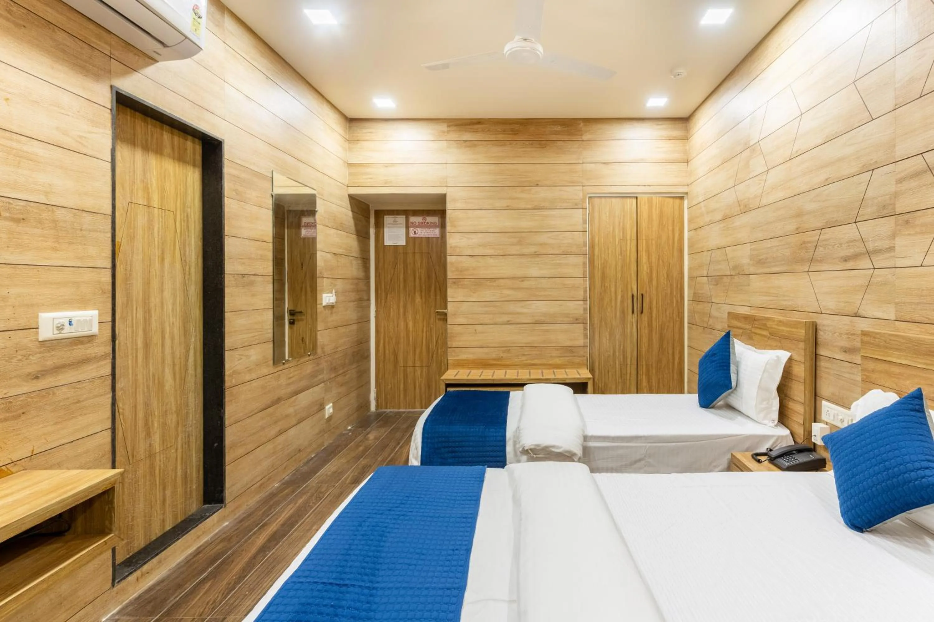 Photo of the whole room, Bed in Hotel Noble Inn, Ahmedabad