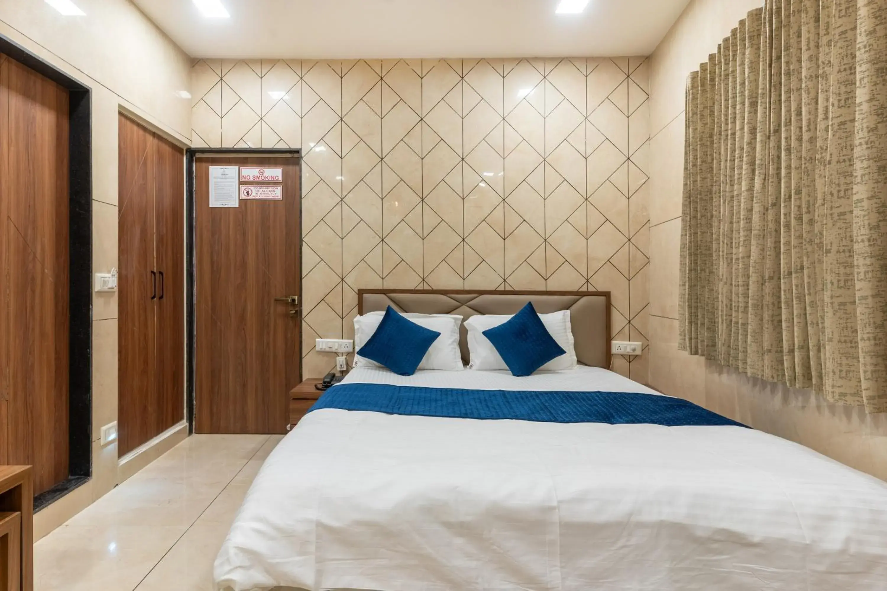 Bed in Hotel Noble Inn, Ahmedabad Bed in Hotel Noble Inn, Ahmedabad